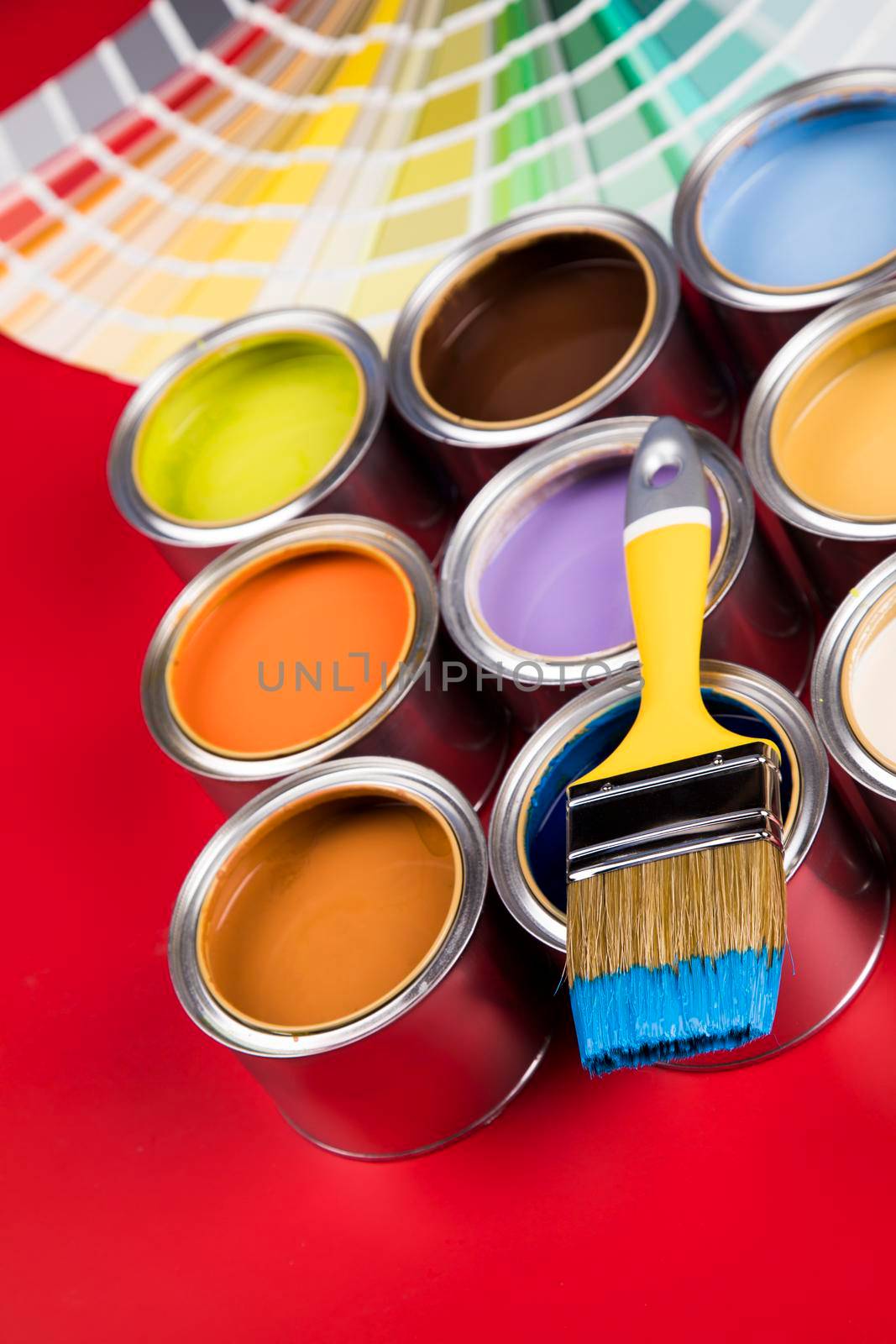 Paint can with a paintbrush by JanPietruszka