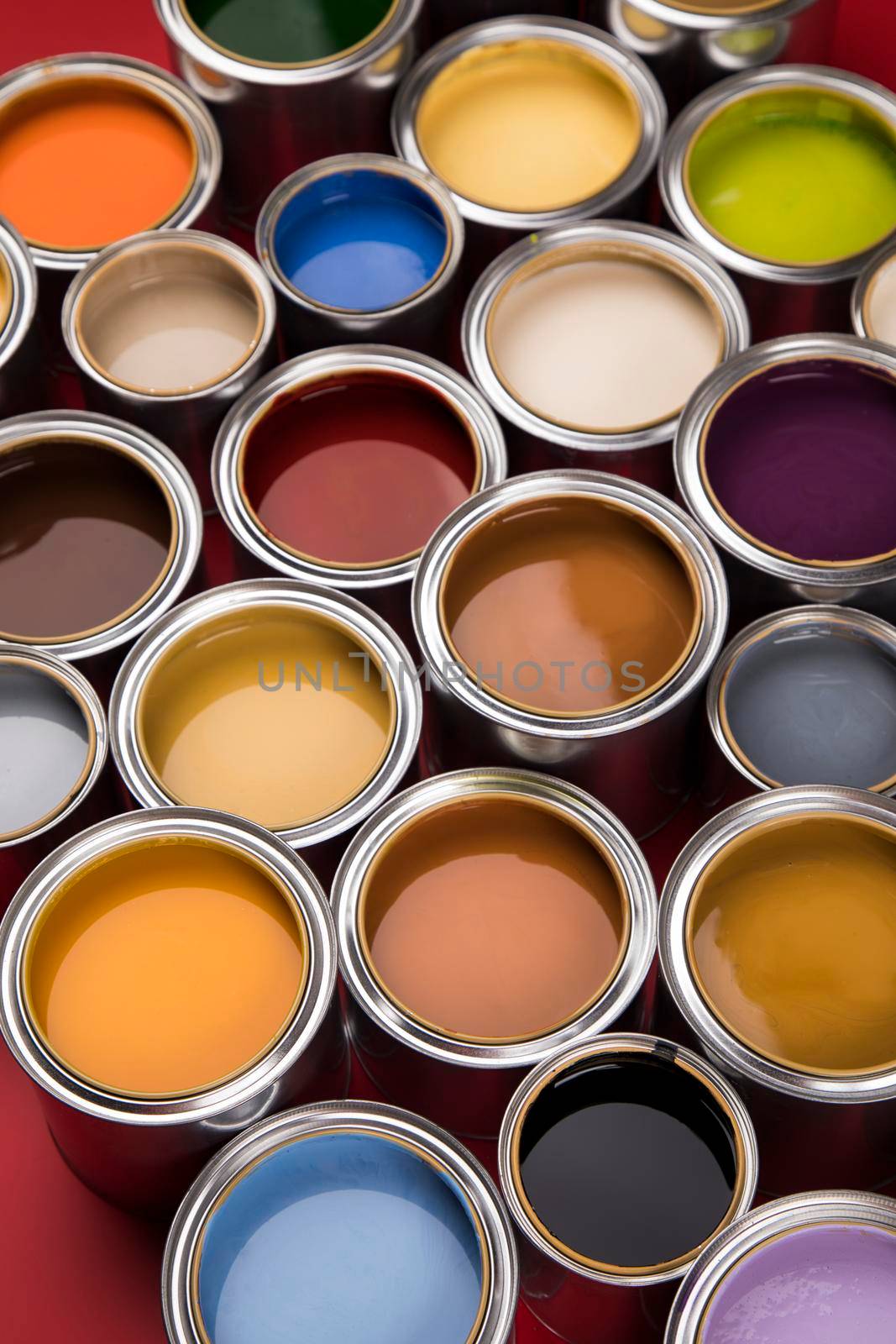 Group of tin metal cans with color paint