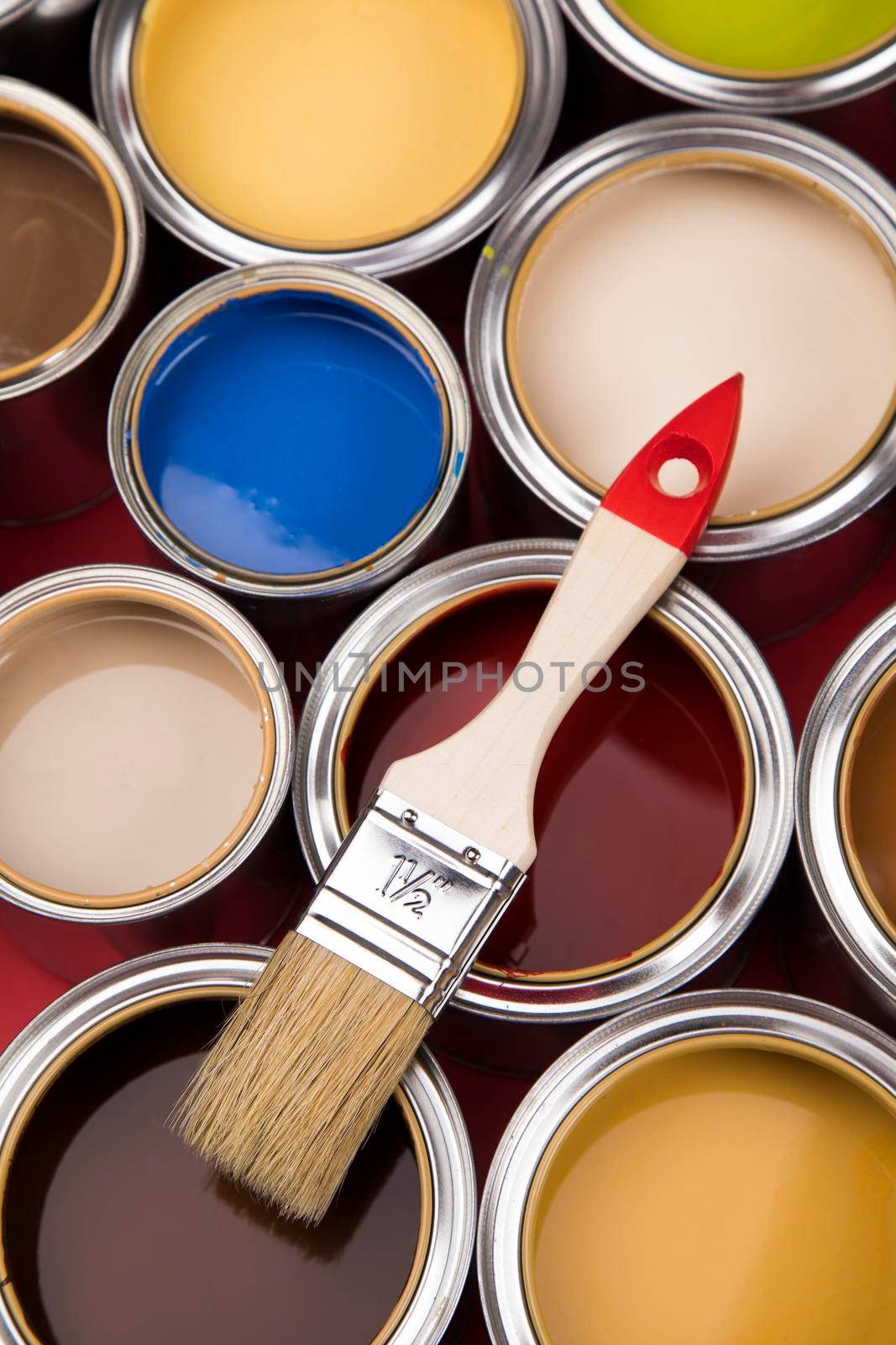 Open paint cans with a brush, Rainbow colors