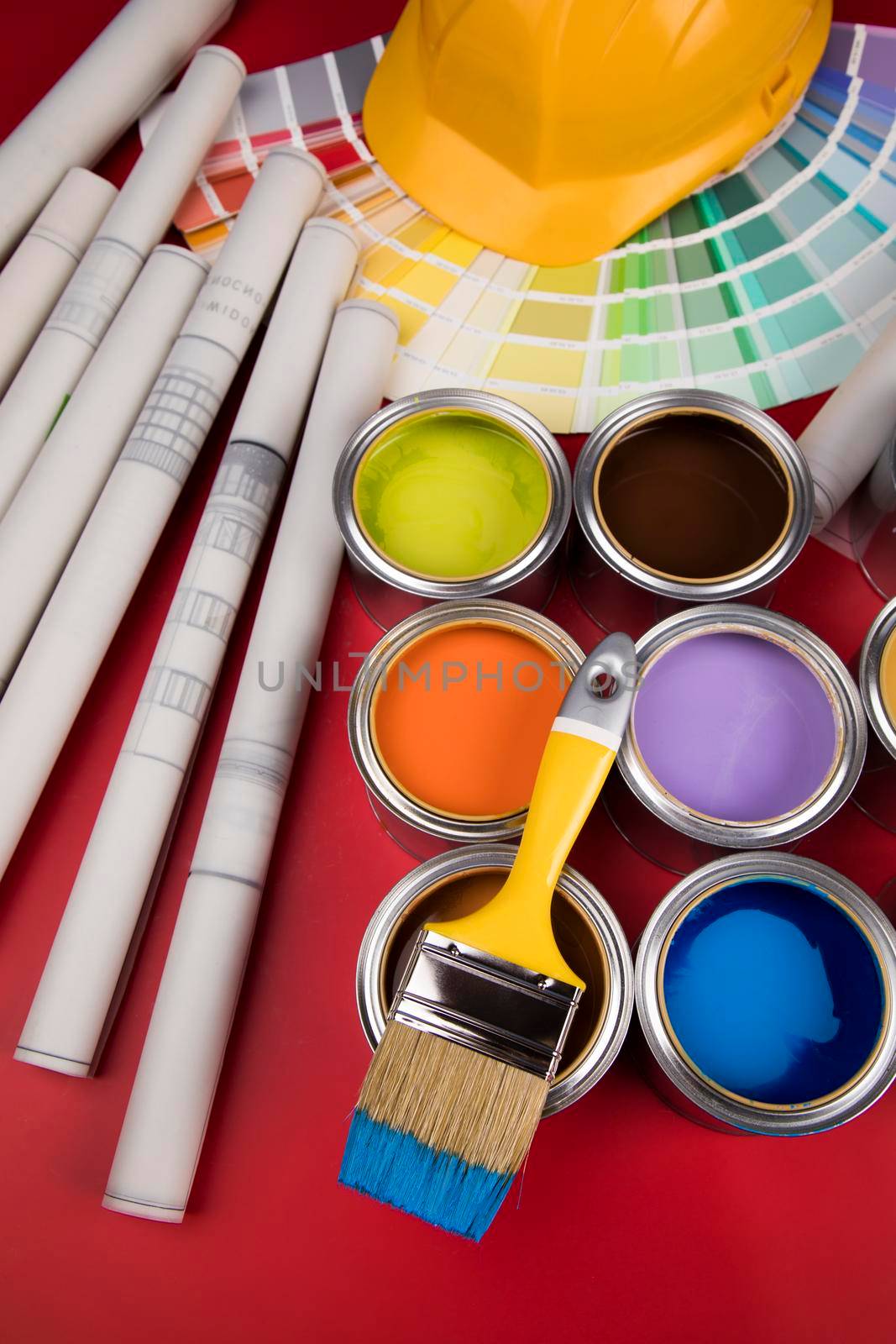 Colorful paint cans with paintbrush by JanPietruszka