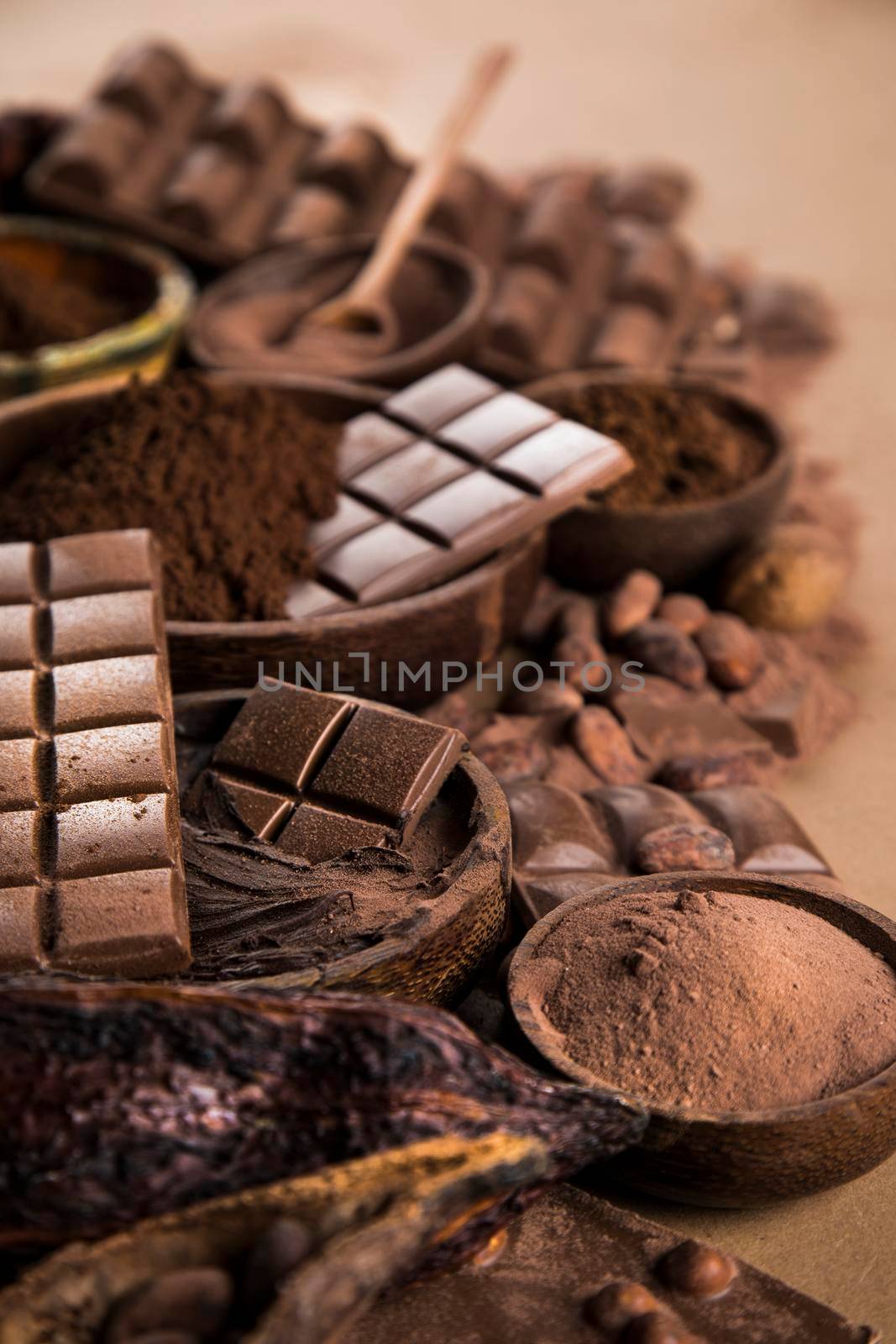 Chocolate sweet, cocoa pod and food dessert background  by JanPietruszka