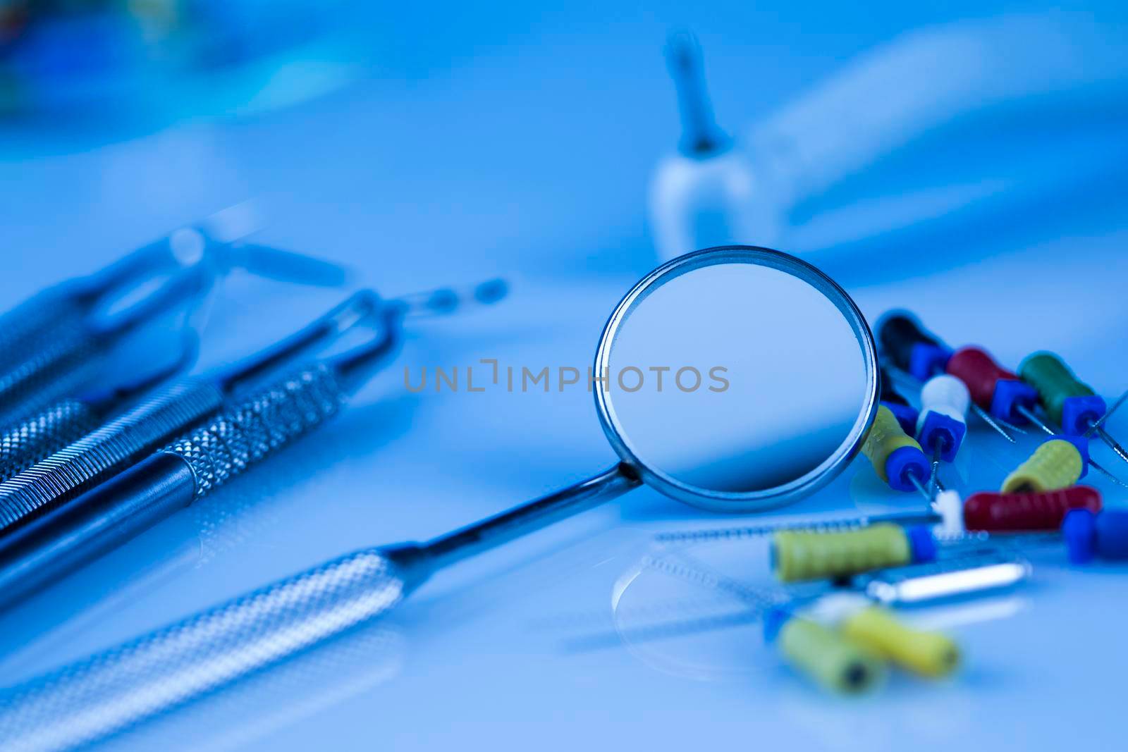 Dentist equipment on blue background