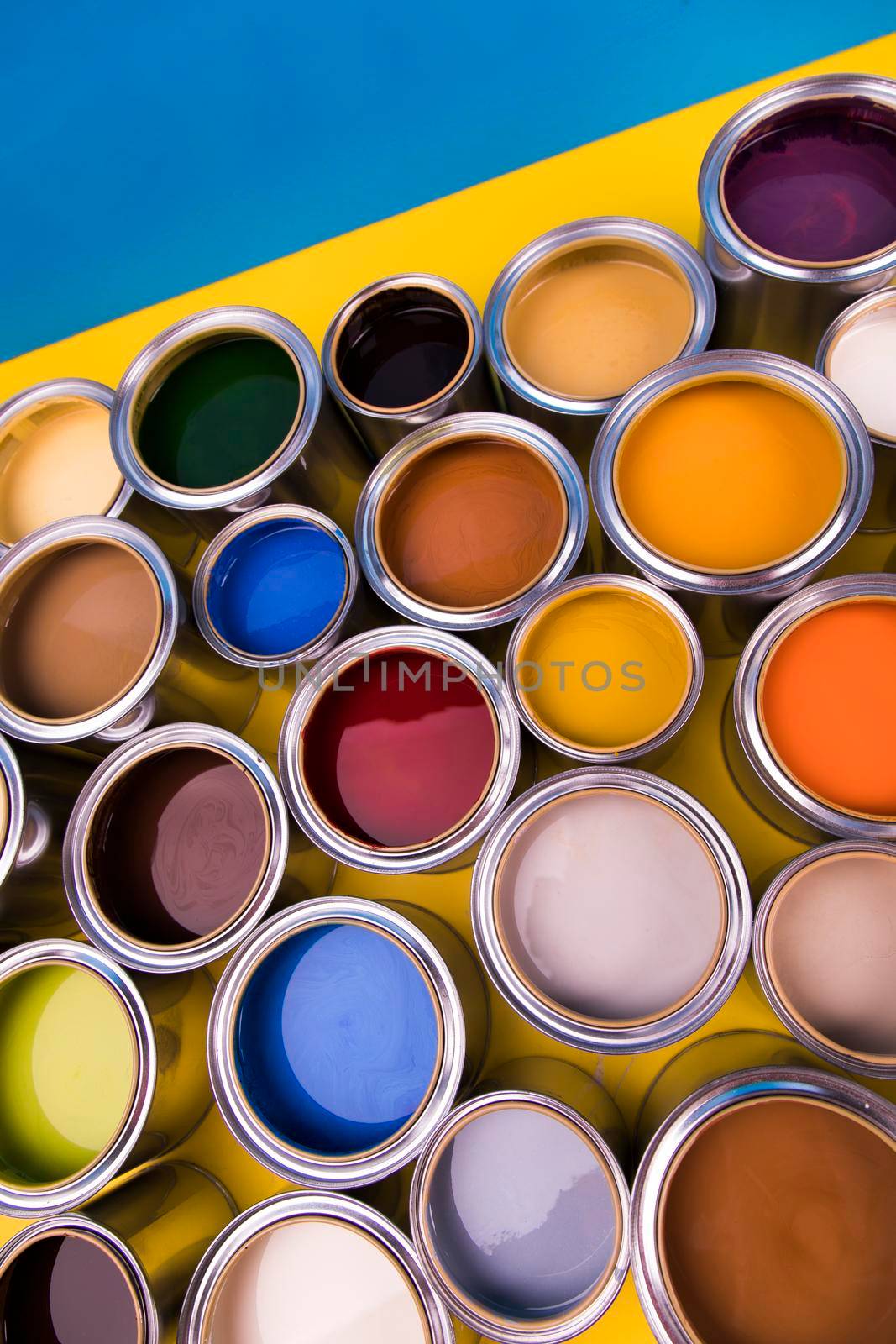 Group of tin metal cans with color paint