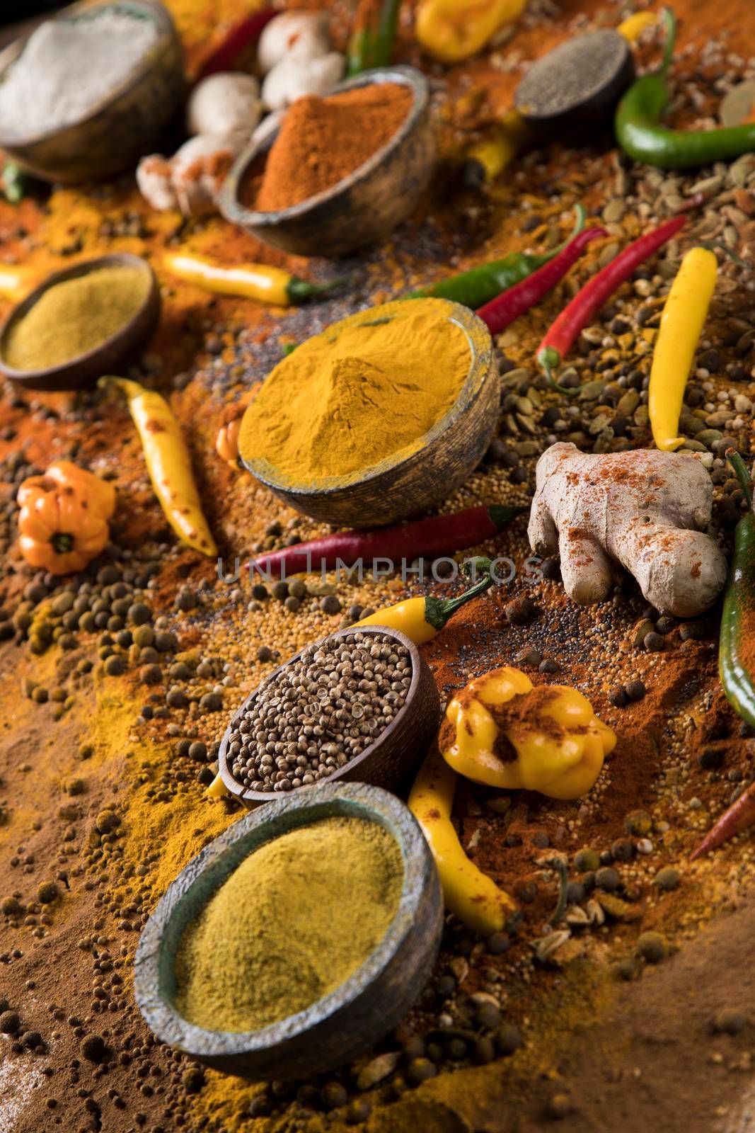 Hot spices in wooden bowls