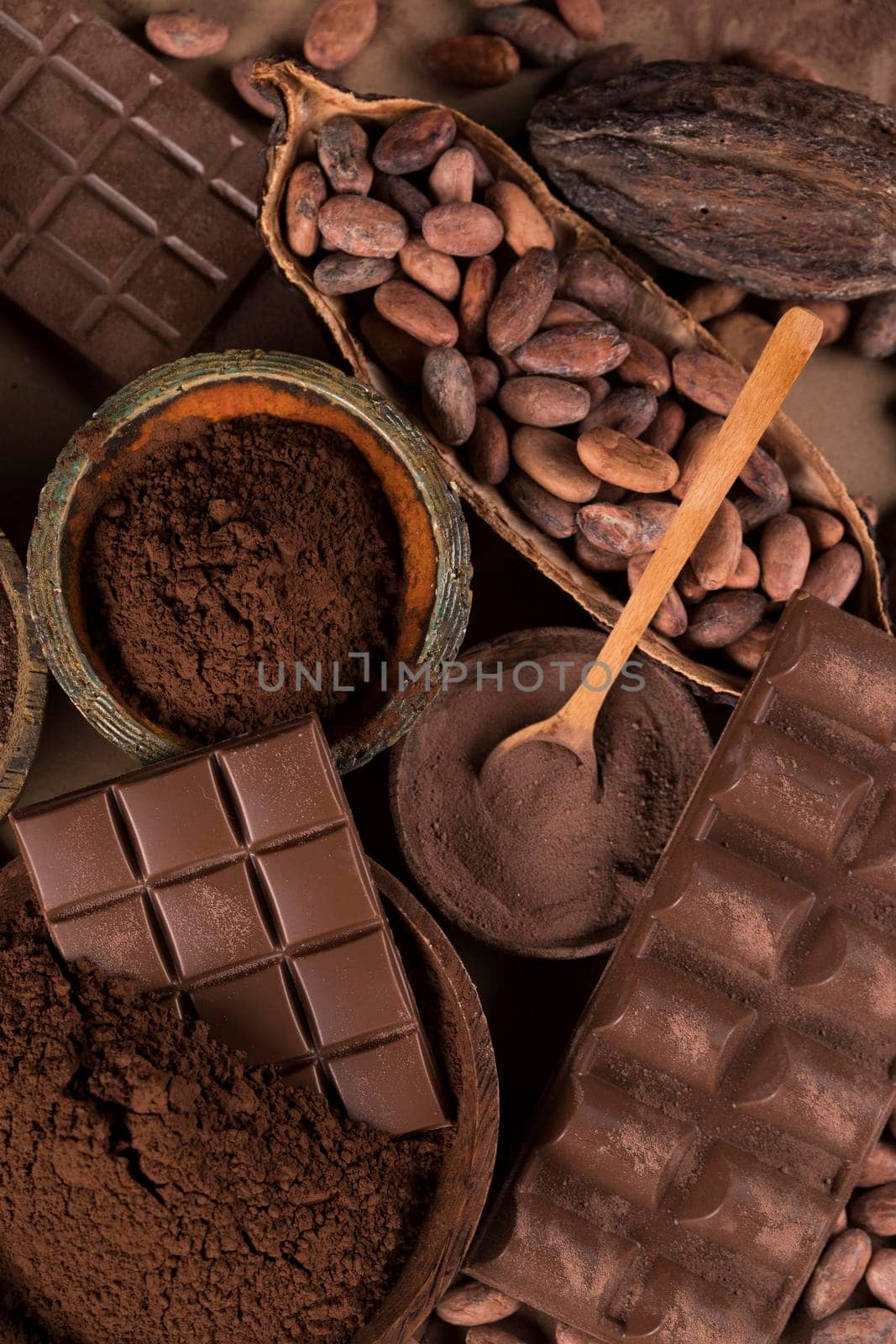 Chocolate sweet, cocoa pod and food dessert background  by JanPietruszka