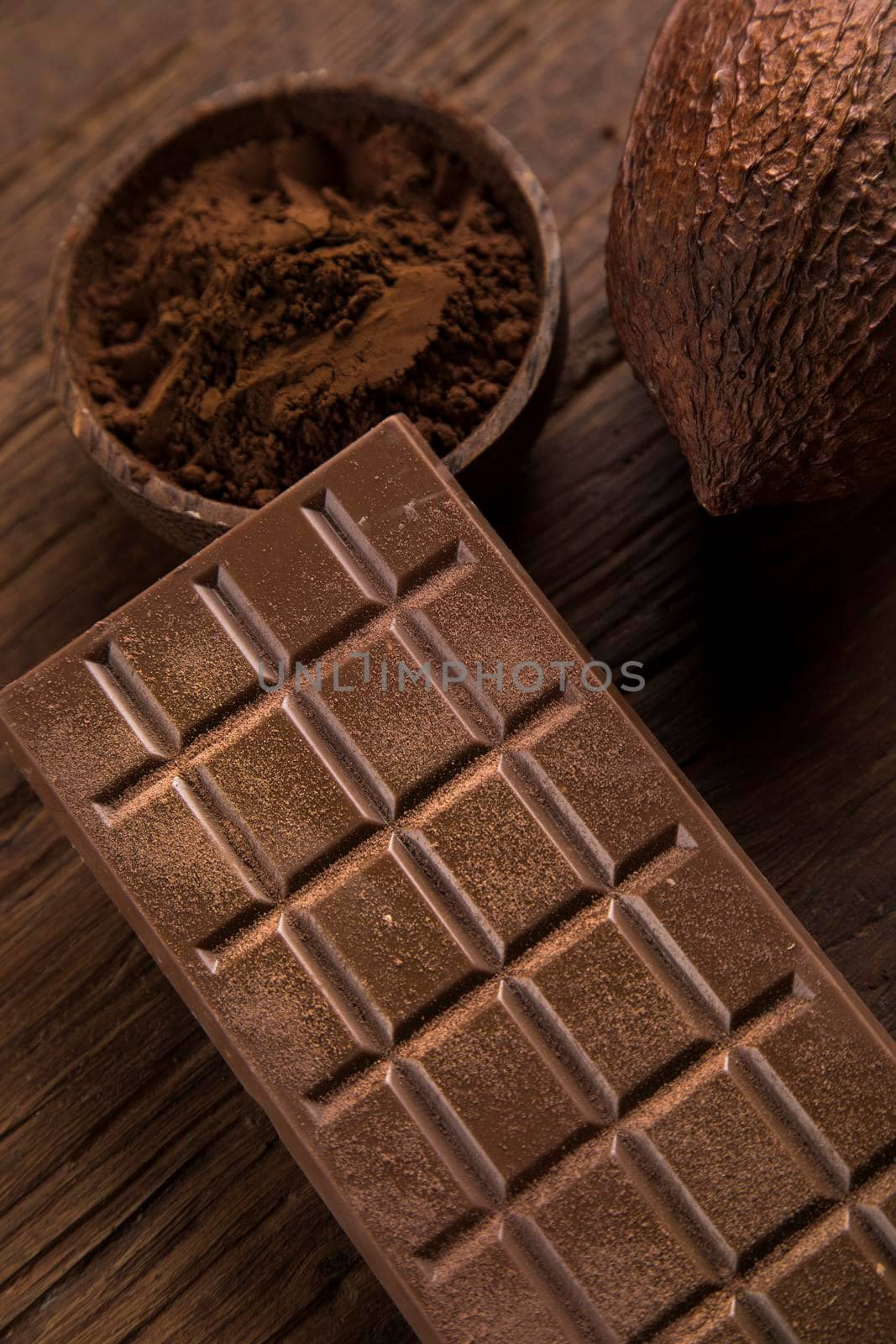 Chocolate bar, candy sweet, cacao beans and powder  by JanPietruszka