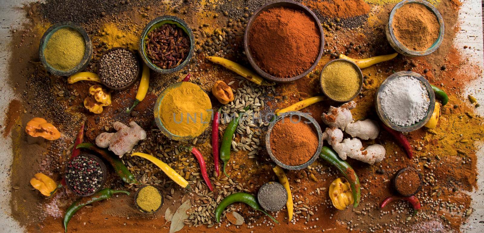 A selection of spices on stone background