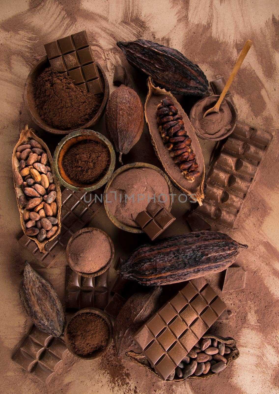 Chocolate sweet, cocoa pod and food dessert background  by JanPietruszka