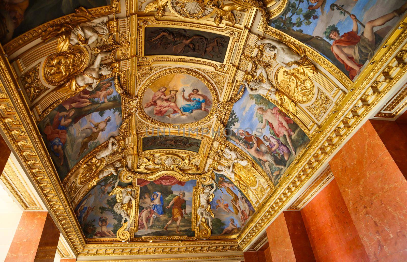 Paris / France - April 05 2019. Inside of richly decorated louvre museum. Beautiful ceiling