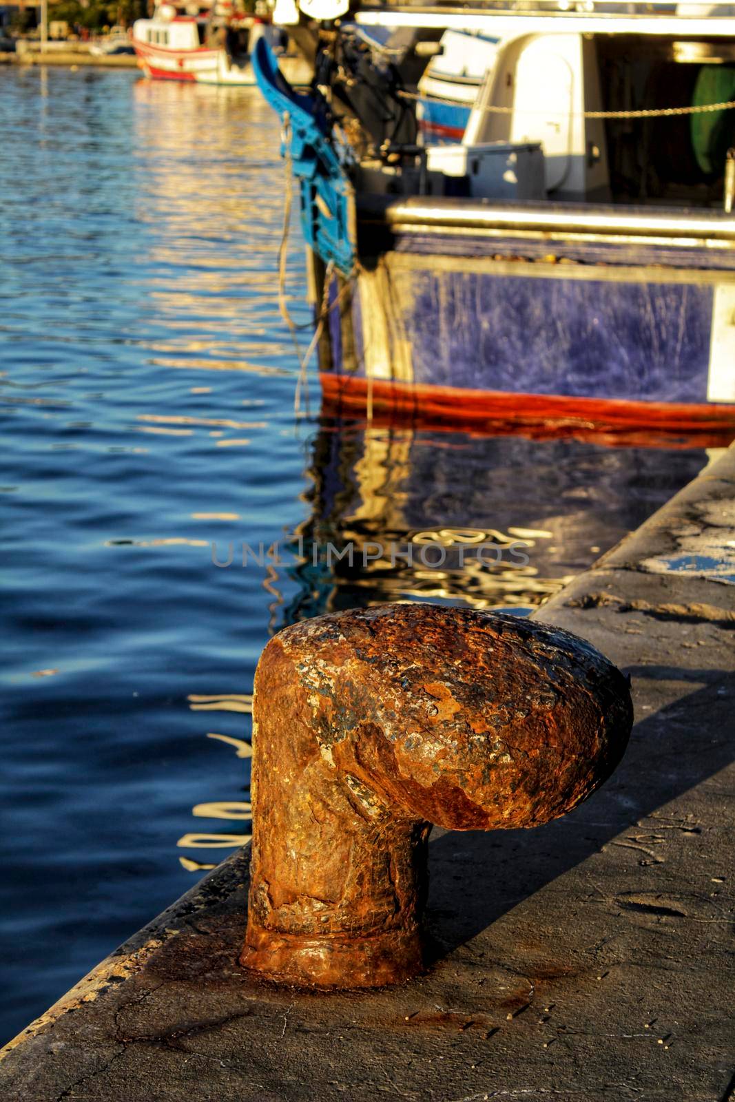 Rusty Mooring Bollard in the port of Santa Pola, Spain