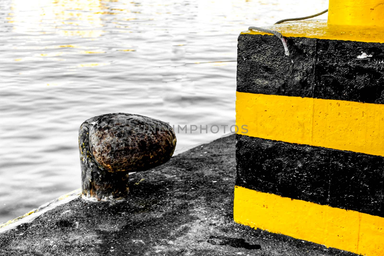 Rusty Mooring Bollard in the port of Santa Pola, Spain
