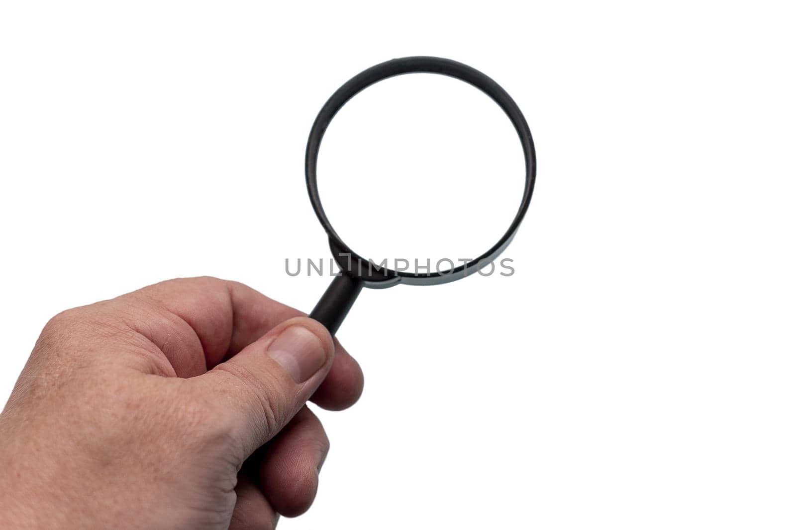 The hand holds a magnifying glass isolate against a white background. by Essffes