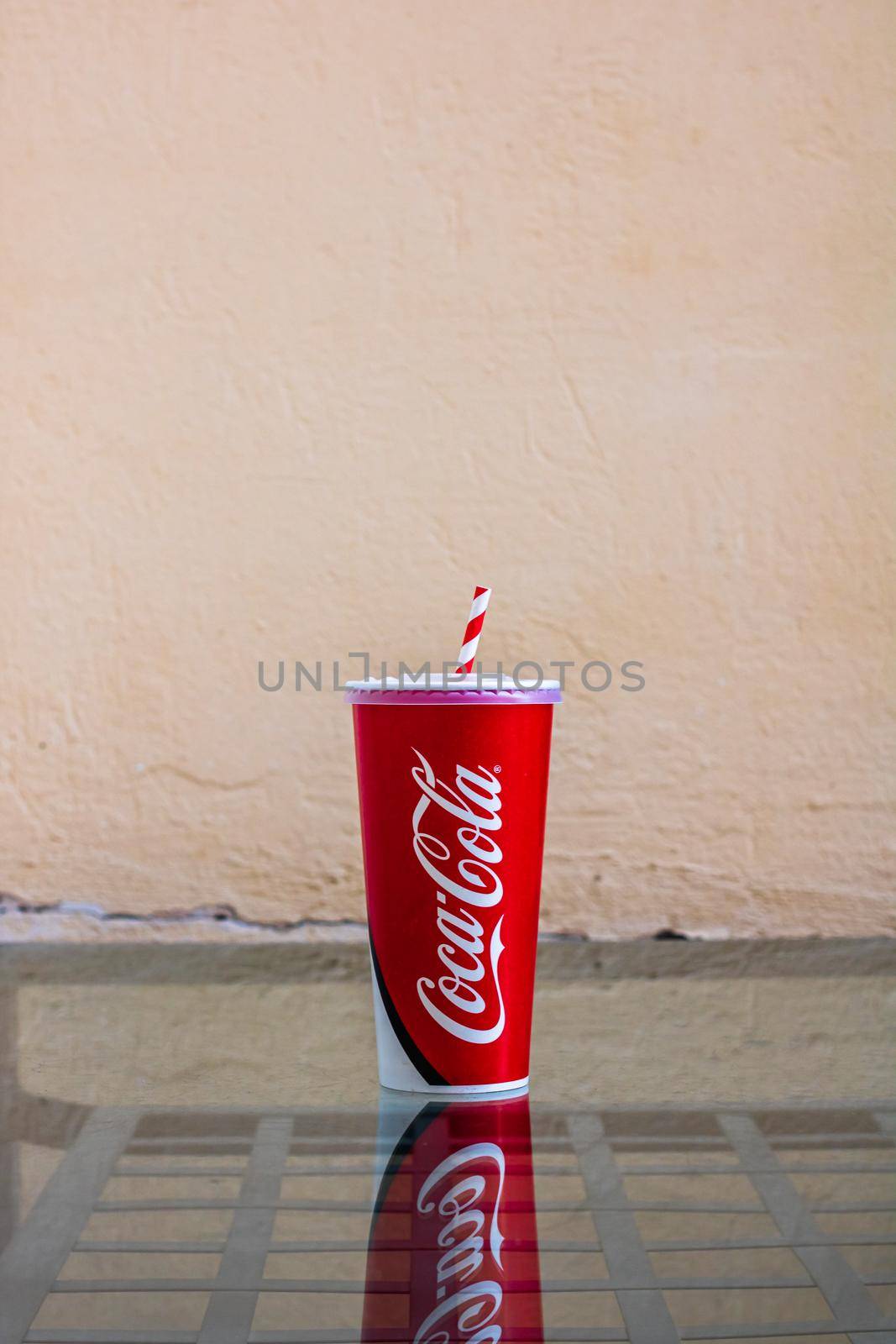 Paper cup with Coca Cola in Bucharest, Romania, 2021 by vladispas
