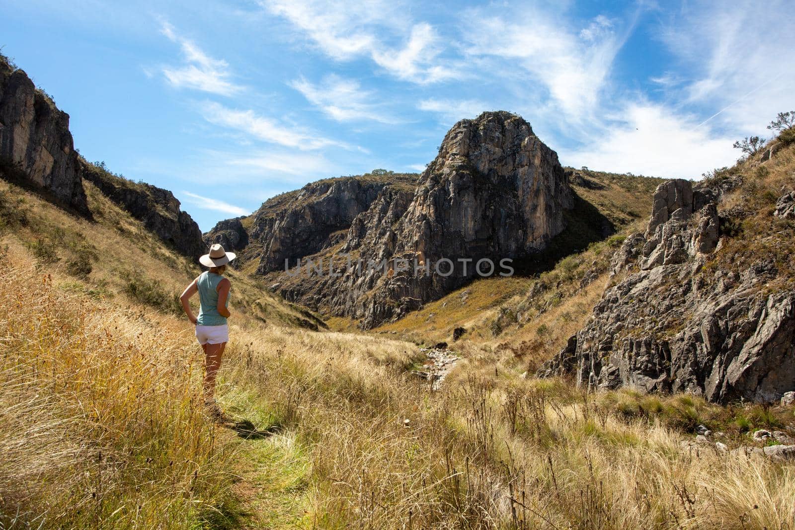 Female exploring and admiring the Snowy Mountains High Plains and gorges in NSW Australia