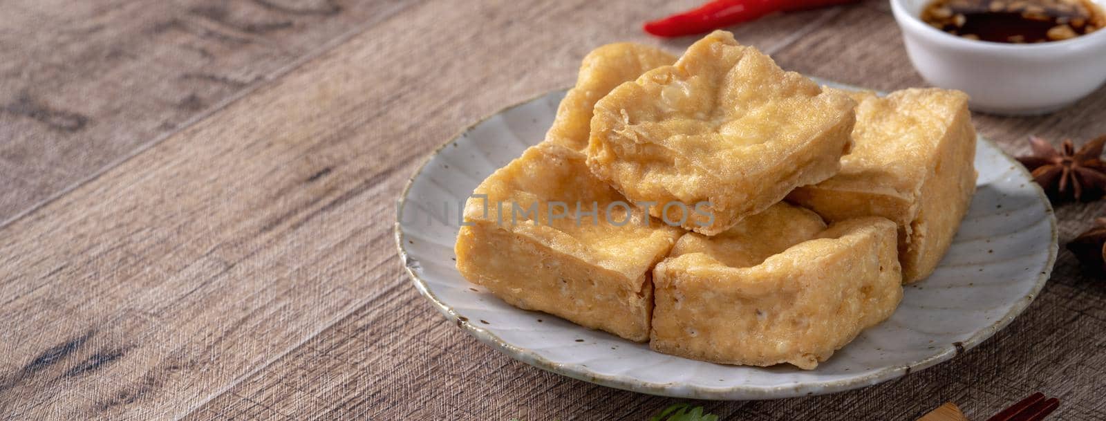 Deep fried stinky tofu, fermented bean curd with pickled cabbage vegetable, famous and delicious street food in Taiwan.