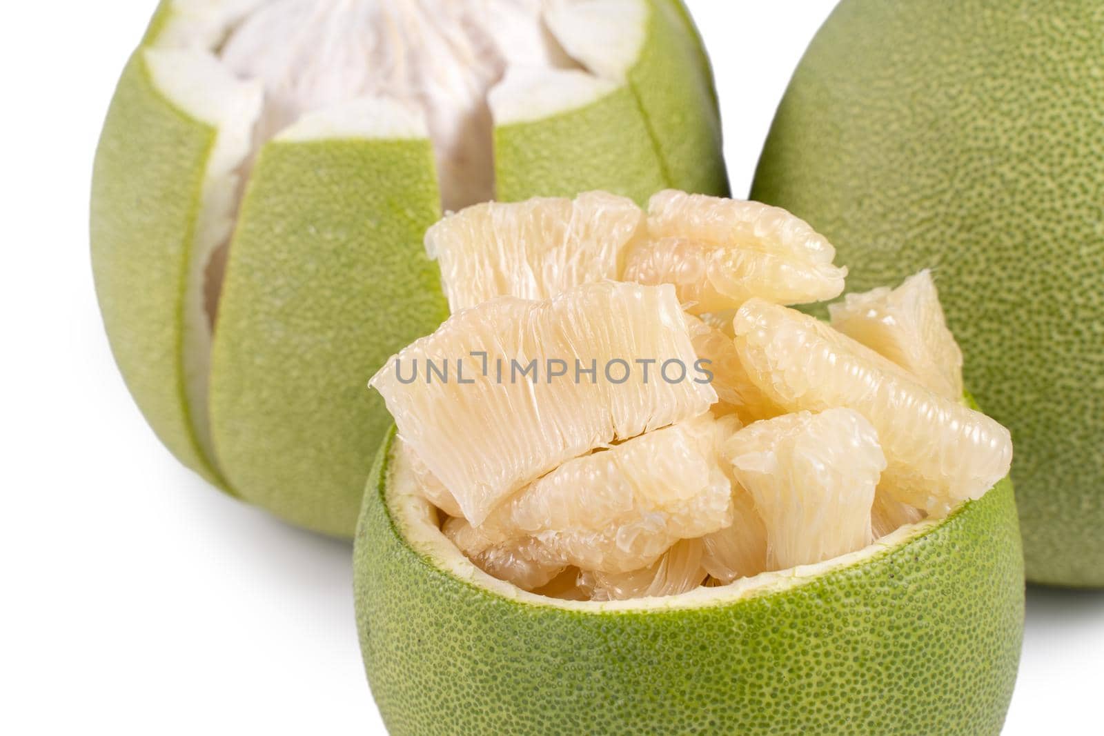 Fresh pomelo, pummelo, grapefruit, shaddock isolated on white background, close up, cut out, clipping path. Fruit for Mid-autumn festival.