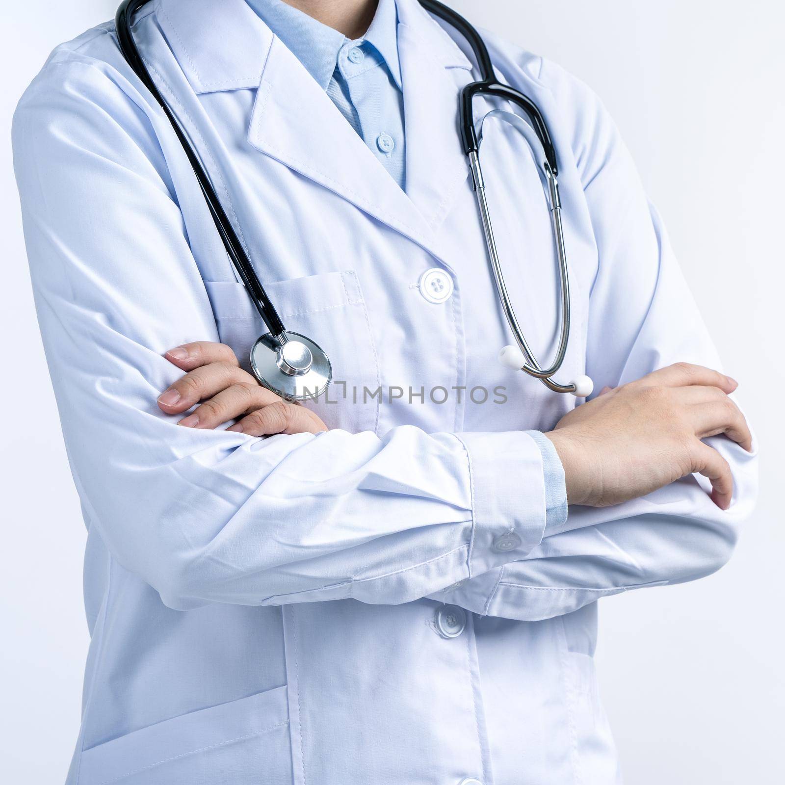 Female doctor body part with hand gesture, young woman physician with stethoscope isolated on white background, close up, cropped view, copy space