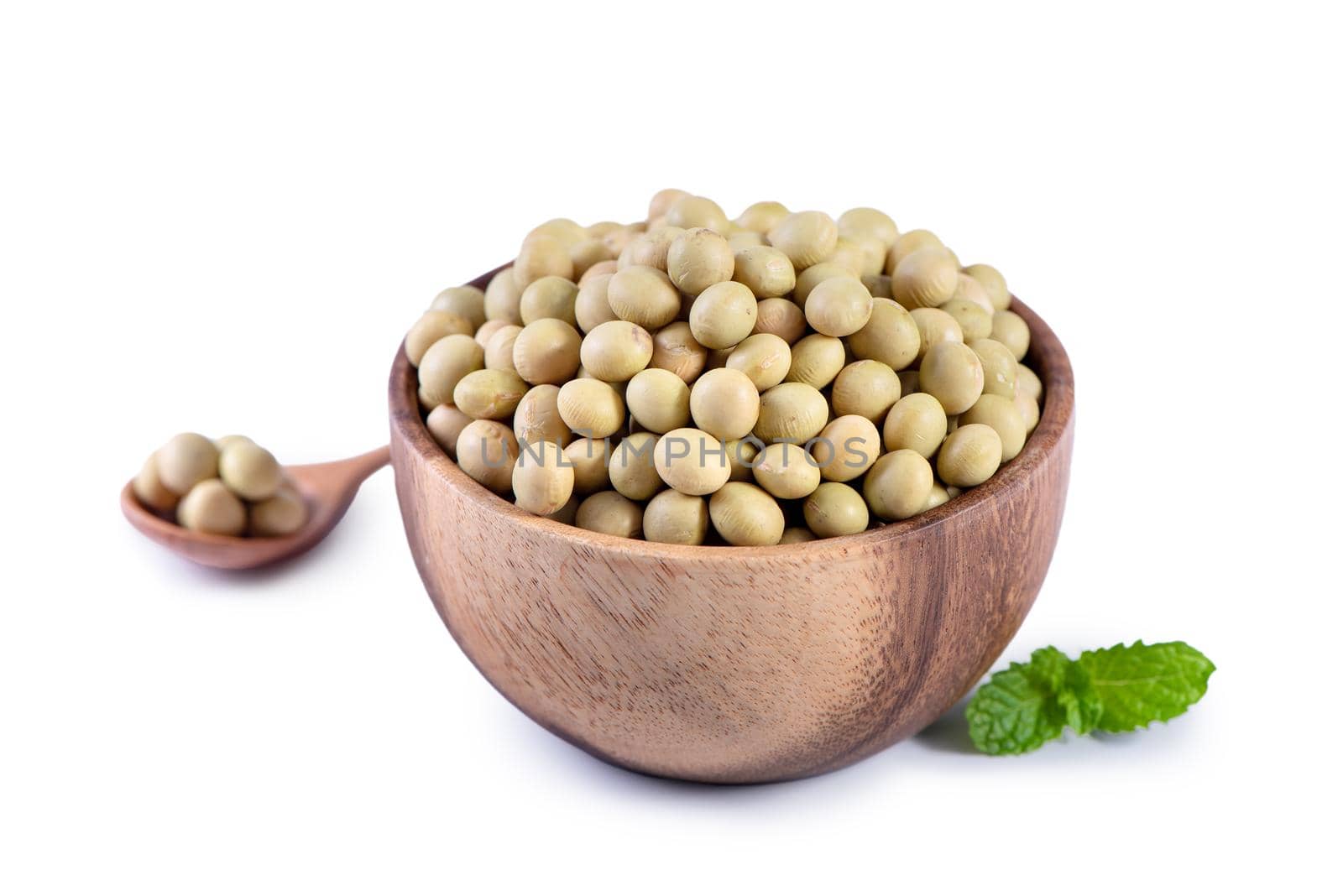 Yellow-green Taiwanese organic non-GMO soybeans, soy beans in a container isolated on white backgorund, close up, clipping path.