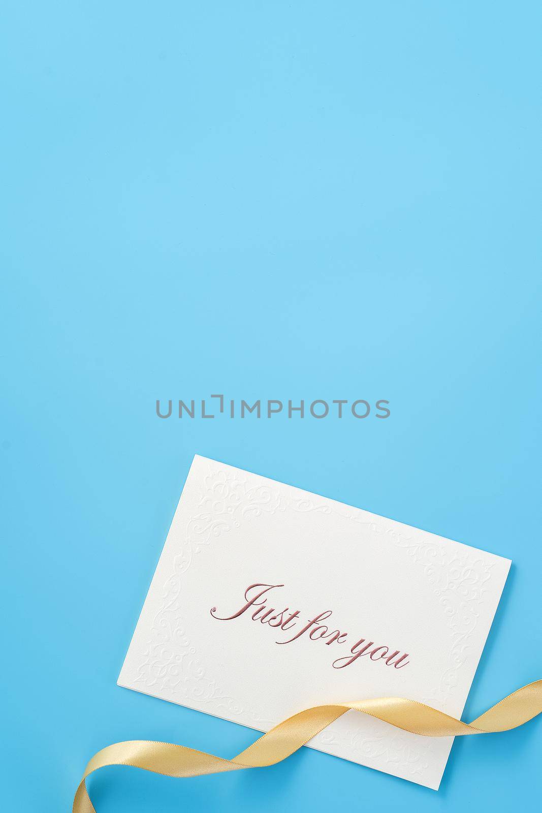 Concept of beautiful Valentine's day, anniversary, mother's day and birthday present and greetings on blue background, copyspace, topview, mockup