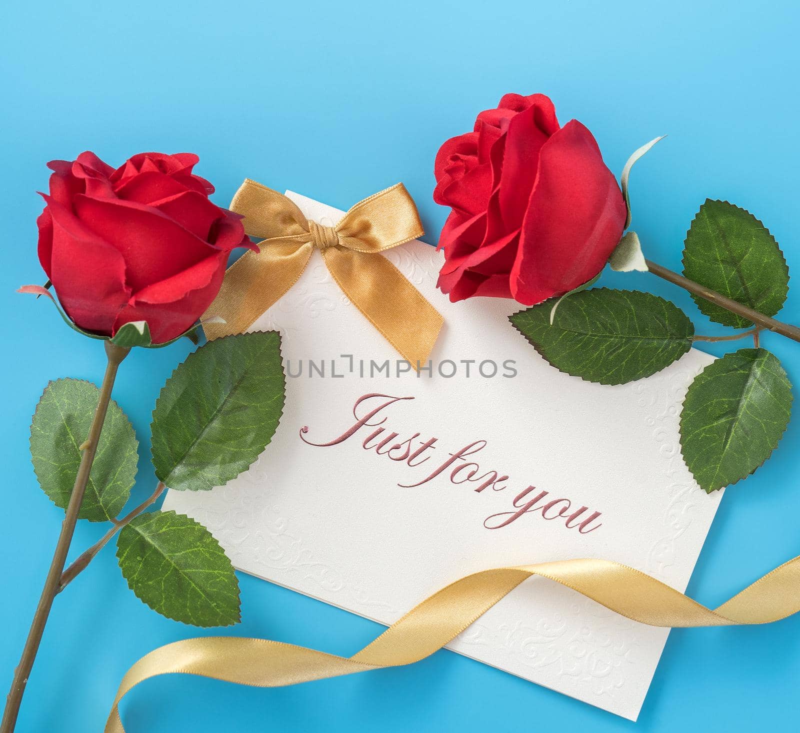 Concept of beautiful Valentine's day, anniversary, mother's day and birthday present and greetings on blue background, copyspace, topview, mockup