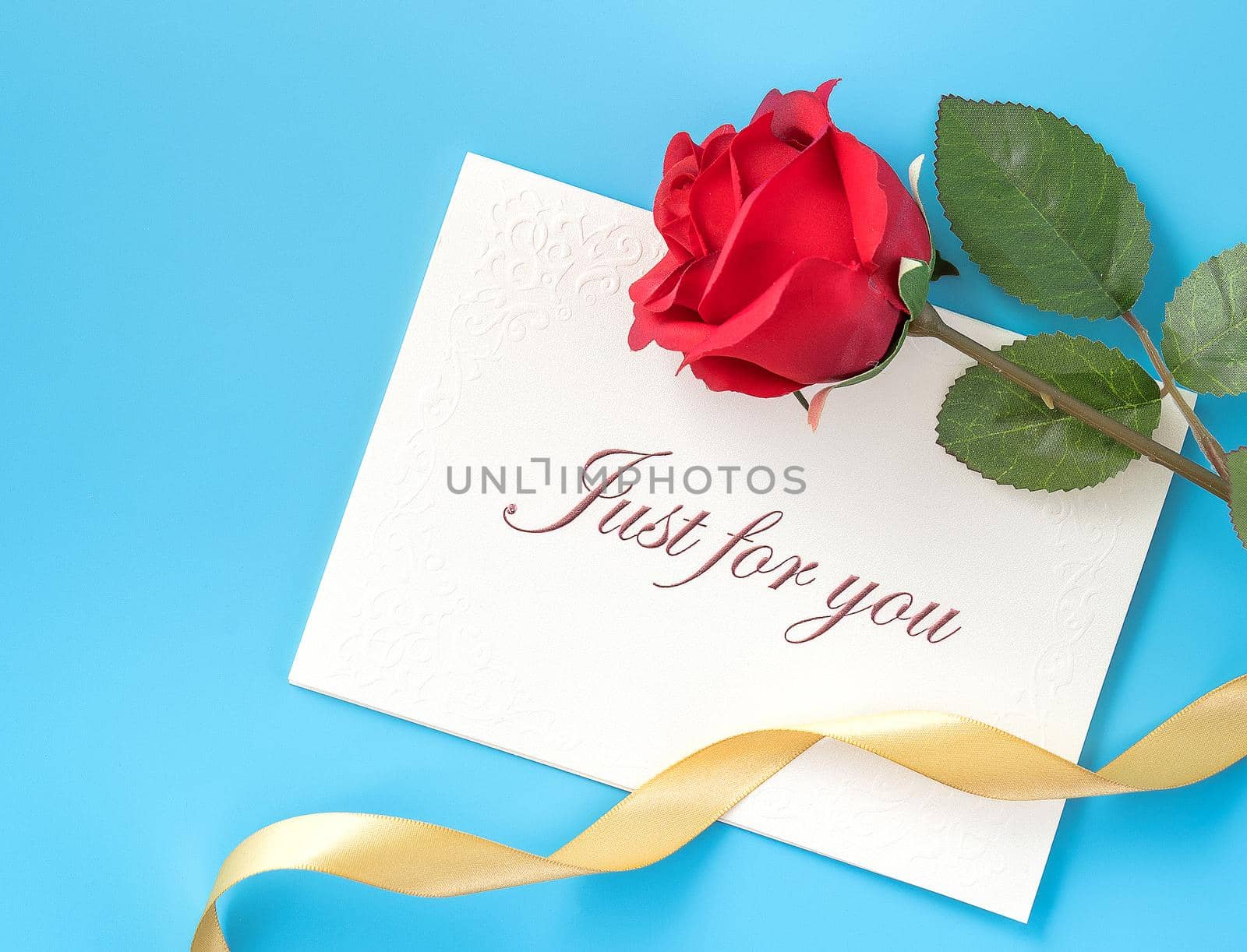 Concept of beautiful Valentine's day, anniversary, mother's day and birthday present and greetings on blue background, copyspace, topview, mockup