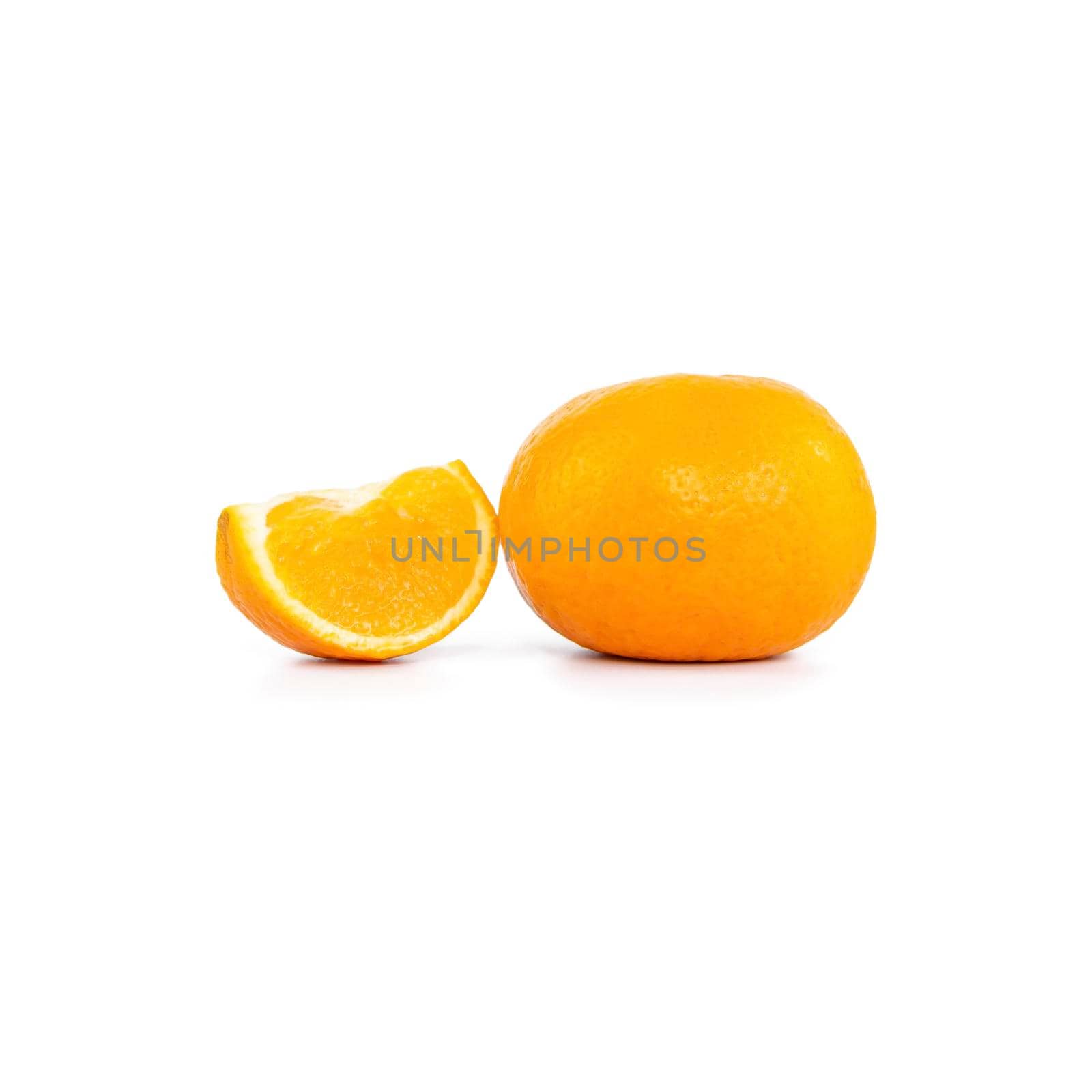 One tangerine or orange and one sliced ​​orange on white background