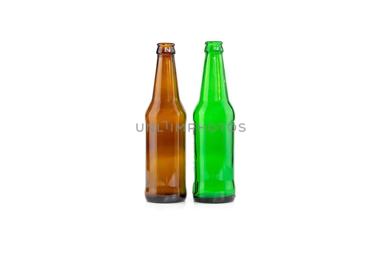 Empty brown and green beers bottles isolated on white background
