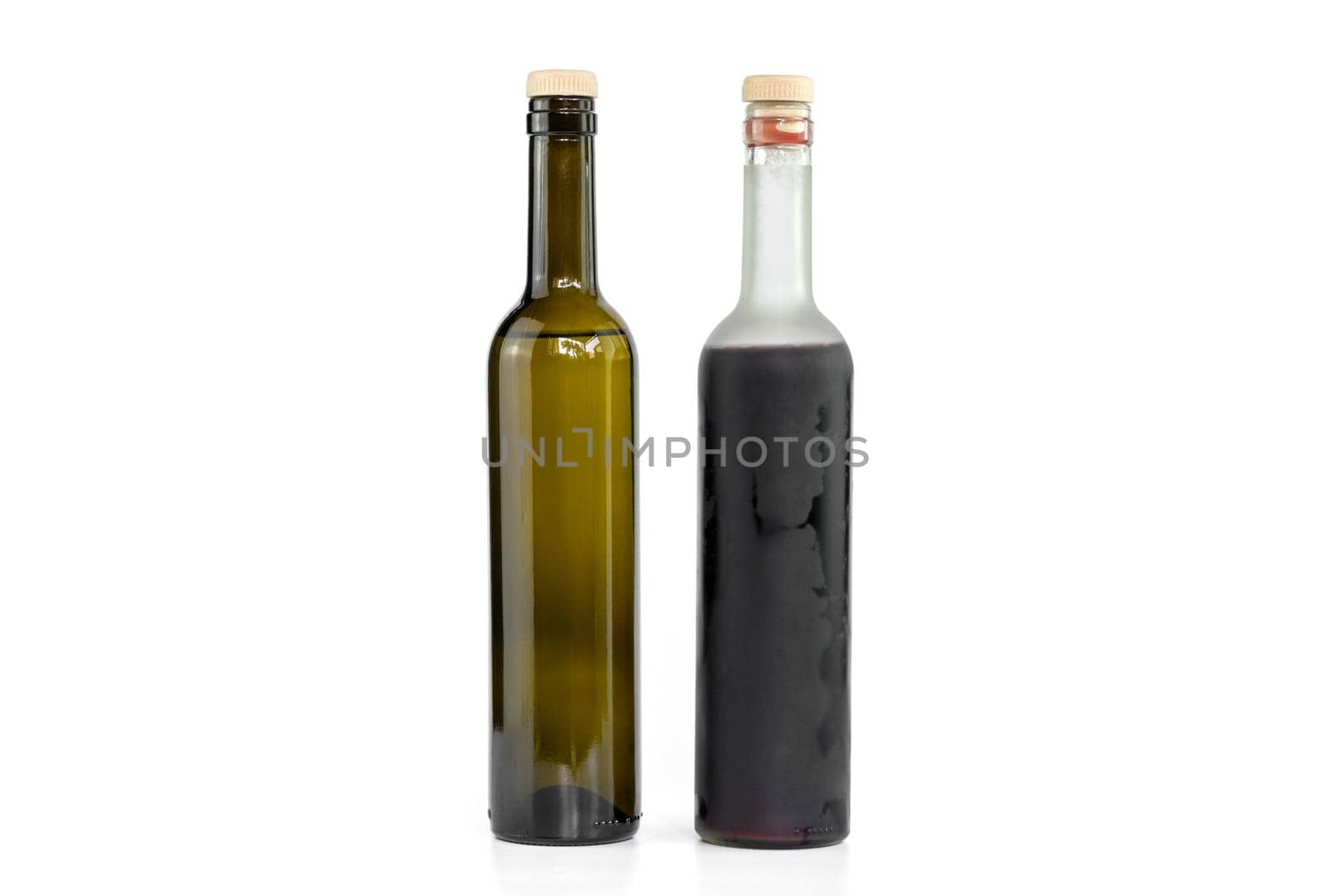White and red wine bottles isolated on white background. by wattanaphob