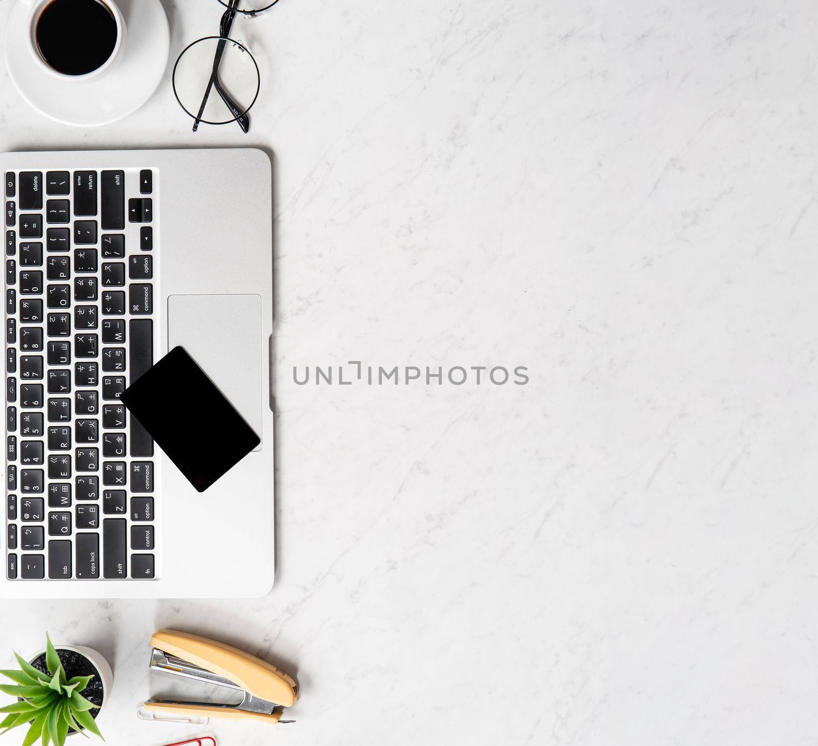 Online payment concept, mock up credit card with office desk computer isolated on beautiful marble background, workspace design, topview, flatlay, copyspace. by ROMIXIMAGE