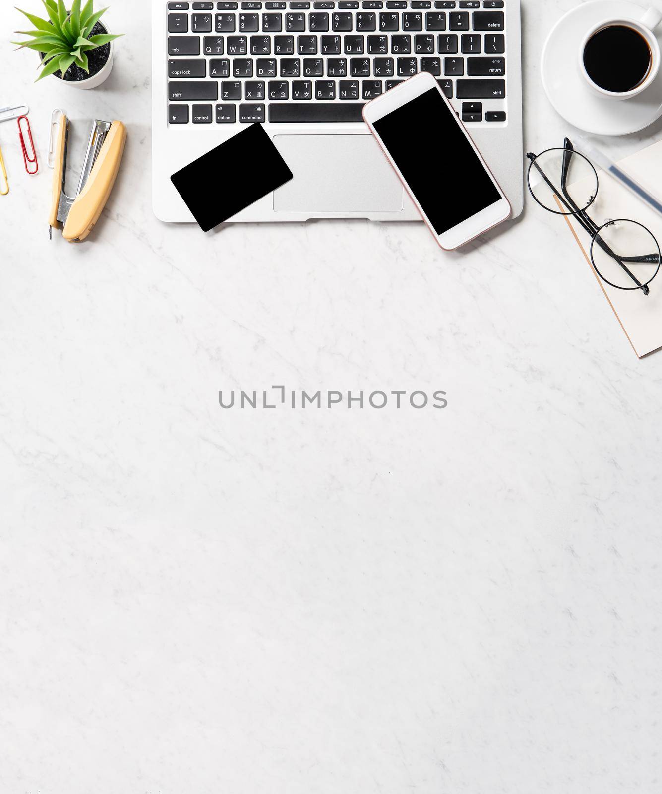 Online purchase concept, mock up credit card with fashion office desk computer isolated on beautiful marble background, workspace design, topview, flatlay, copyspace, closeup
