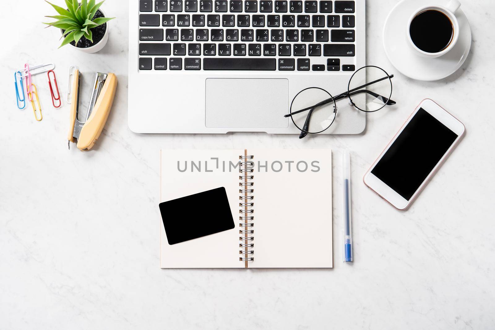 Online purchase concept, mock up credit card with fashion office desk computer isolated on beautiful marble background, workspace design, topview, flatlay, copyspace, closeup