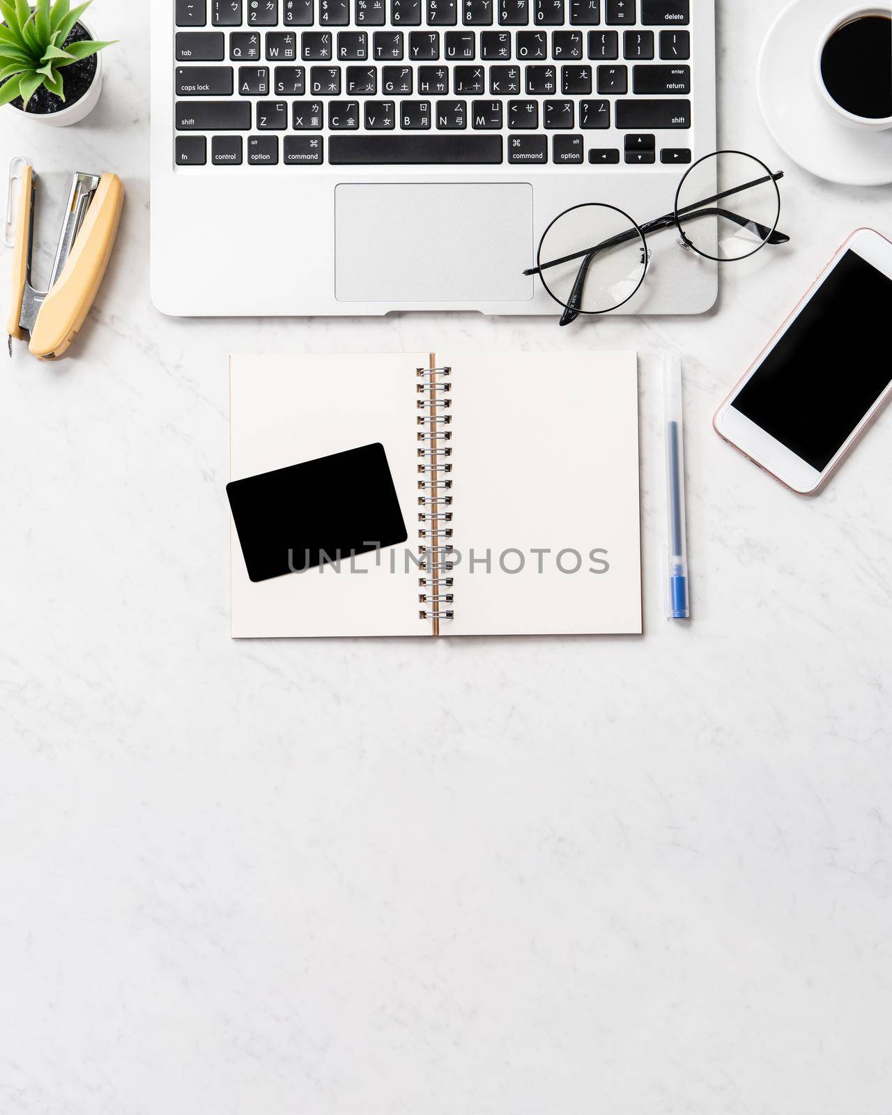 Online purchase concept, mock up credit card with fashion office desk computer isolated on beautiful marble background, workspace design, topview, flatlay, copyspace, closeup
