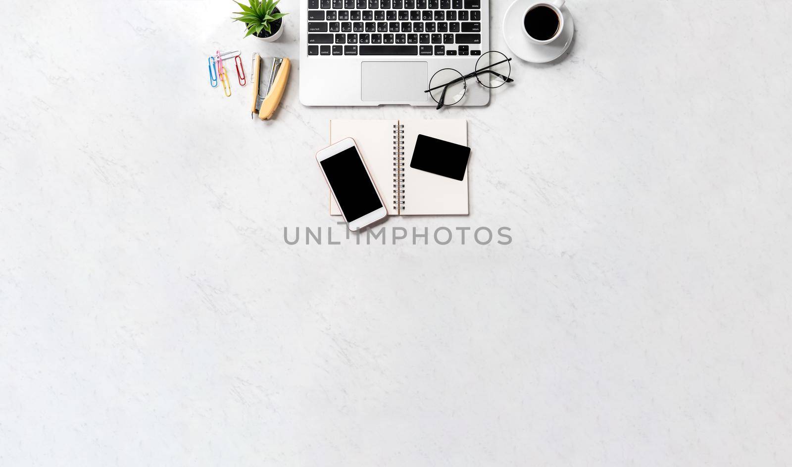 Online purchase concept, mock up credit card with fashion office desk computer isolated on beautiful marble background, workspace design, topview, flatlay, copyspace, closeup