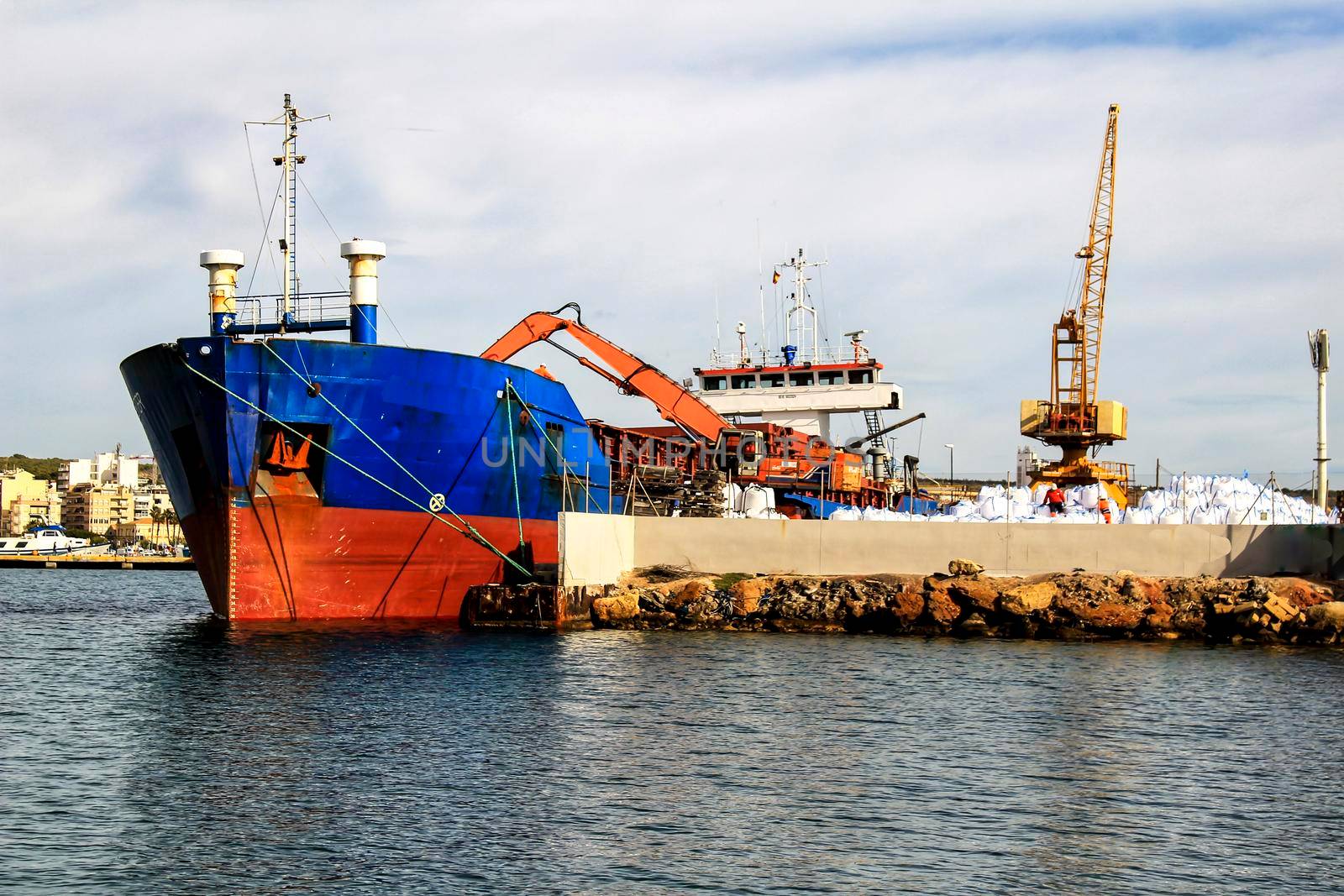 Merchant ship unloading at the dock in Santa Pola, Alicante, Spain