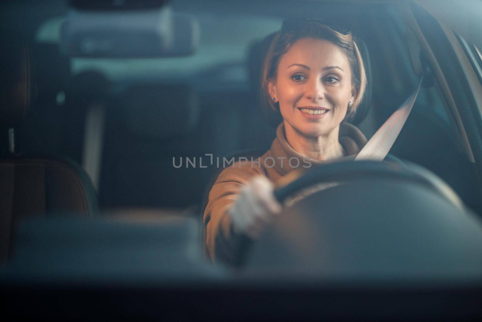 Shot of an attractive mature woman driving her car.