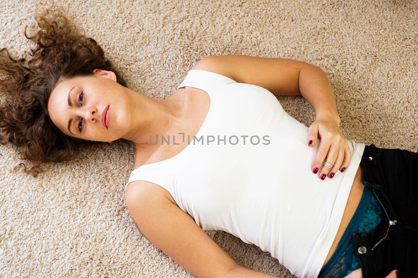 Girl unbuttoned jeans - Lying on the floor by natali_brill