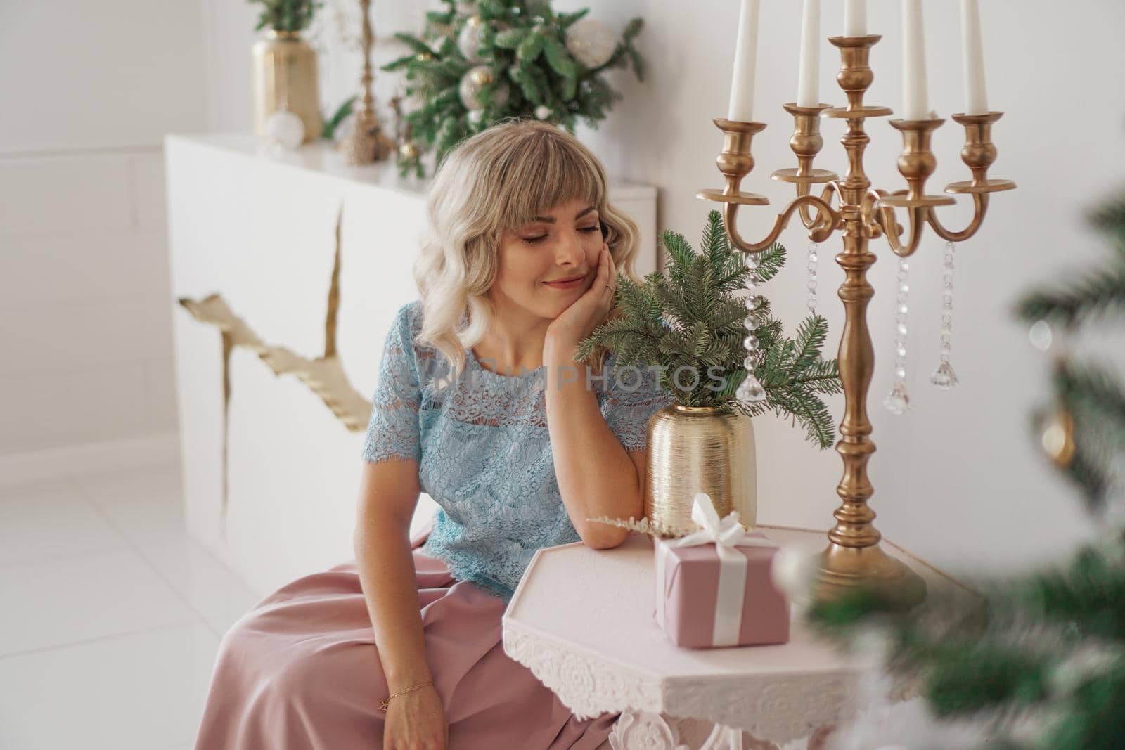 Image of dreaming woman with gift box