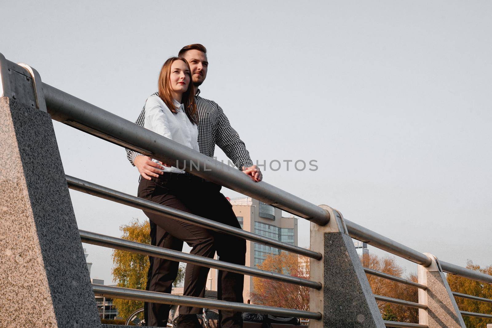 Young and elegant couple in love - autumn park