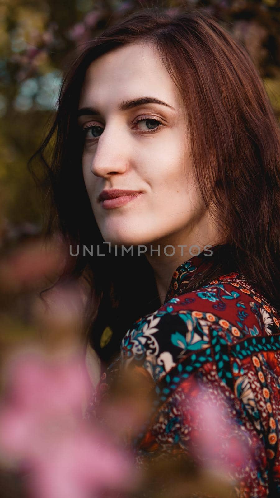Beautiful young woman in burgundy leaves by natali_brill