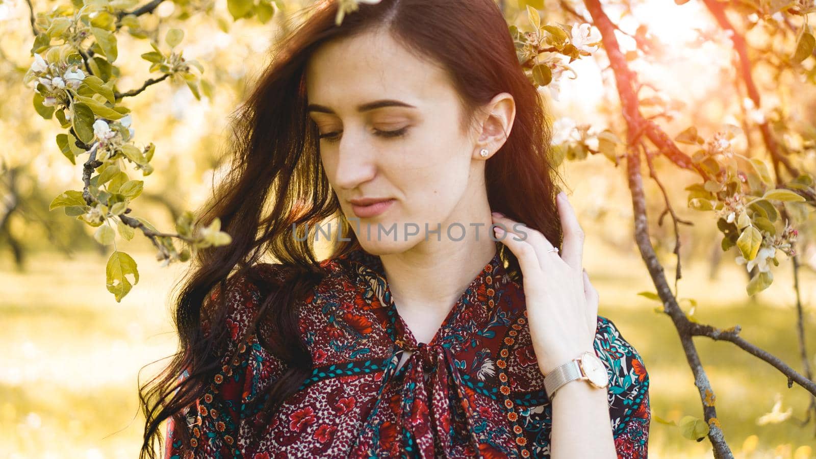 Beautiful Young Woman Outdoor. Enjoy Nature. Healthy Smiling Girl in the Spring Park. Sunny day