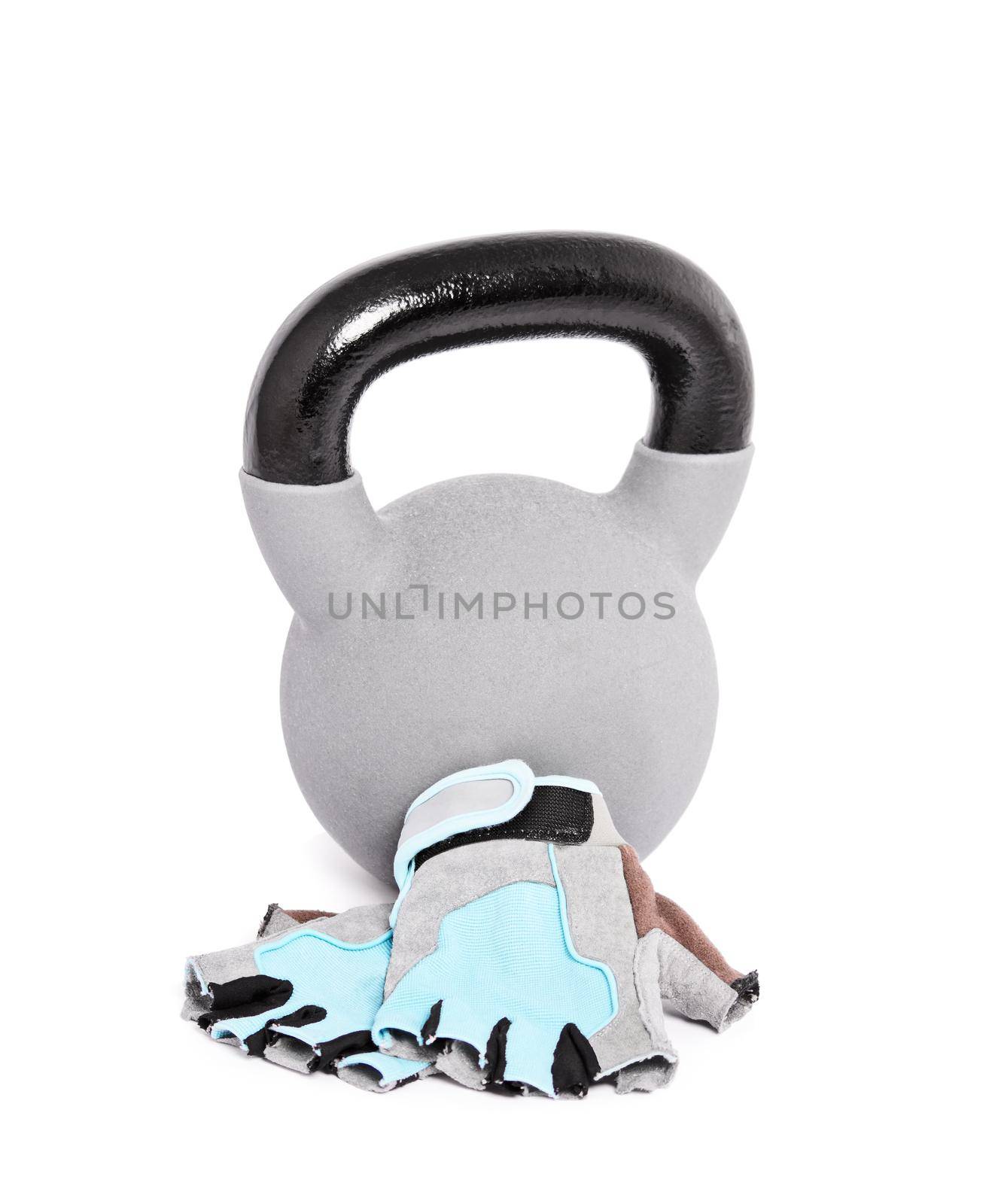 Black and grey kettlebell and weightlifting workout gloves, isolated on white background. Fitness, health, body building concept.