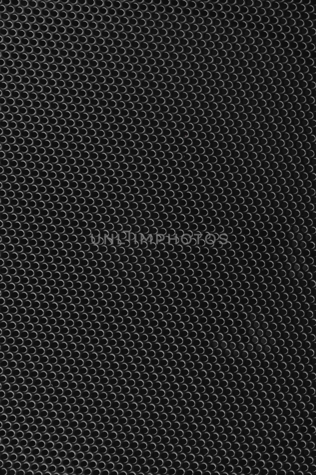 metal mesh of speaker grill texture, close-up view by nikkytok