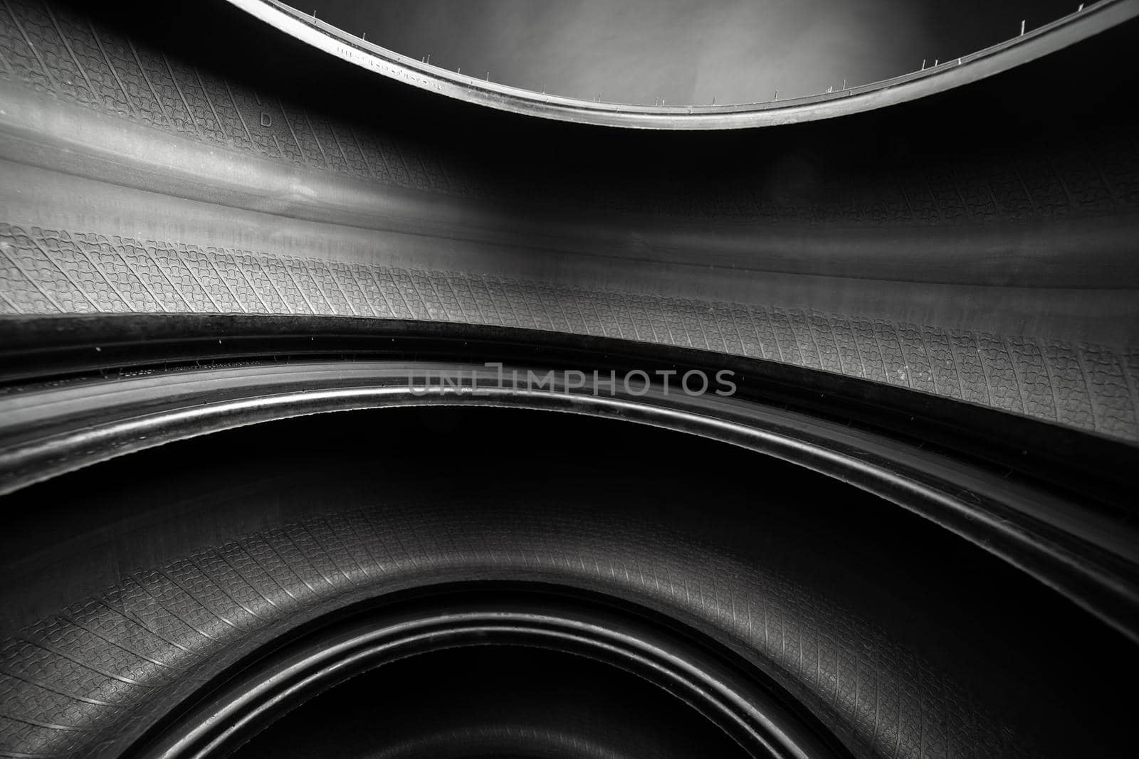 abstract black curved background, inside of car tires by nikkytok