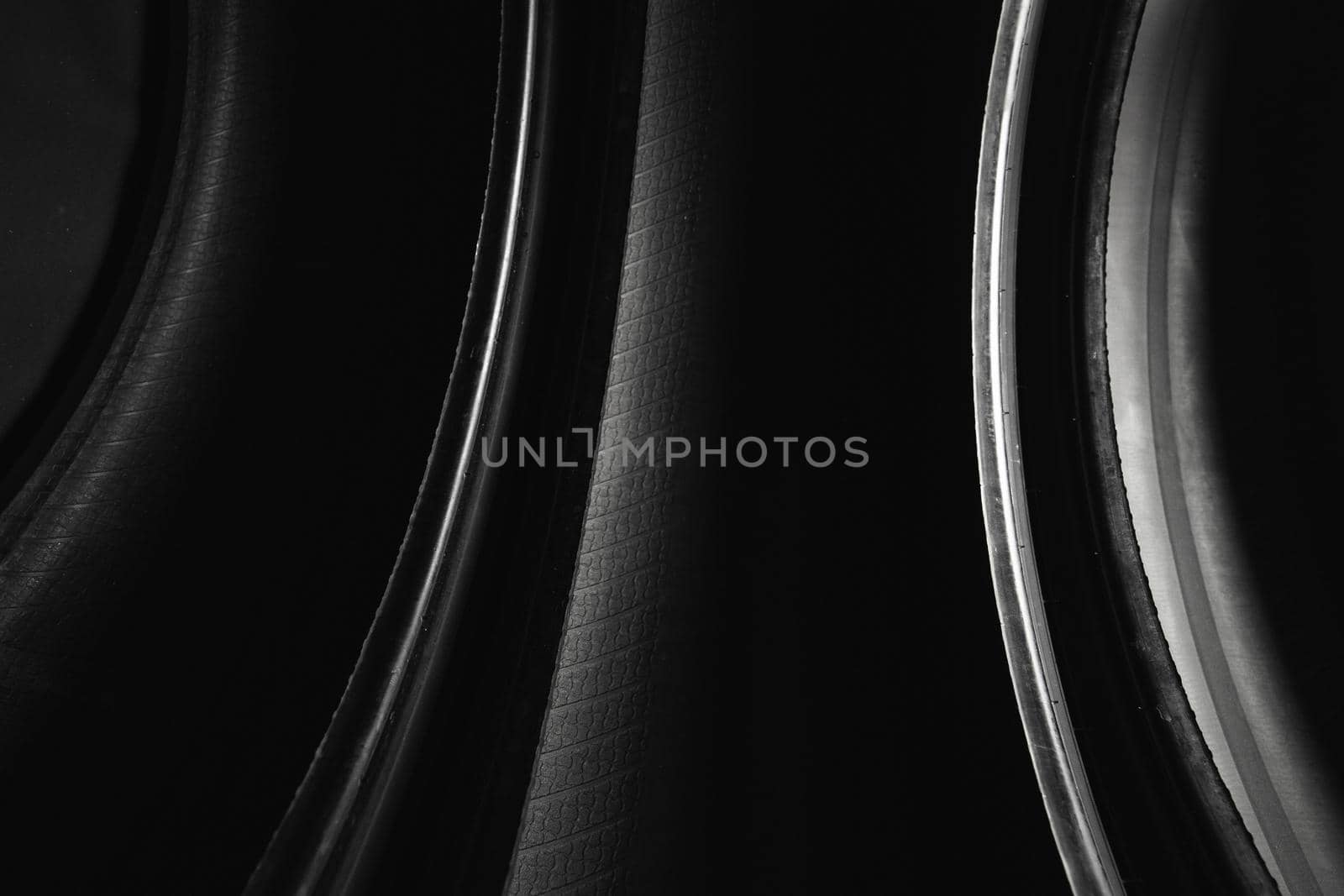 abstract black curved background, inside of car tires by nikkytok