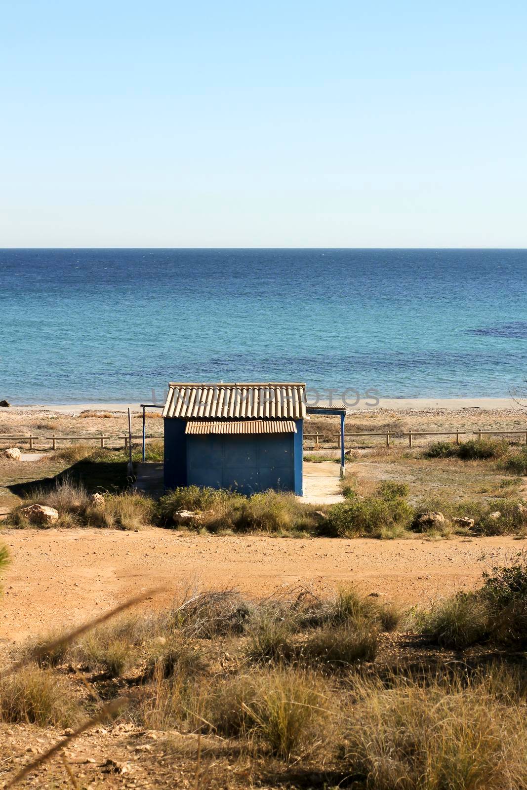 Old blue cabin on the beach in Santa Pola, Alicante