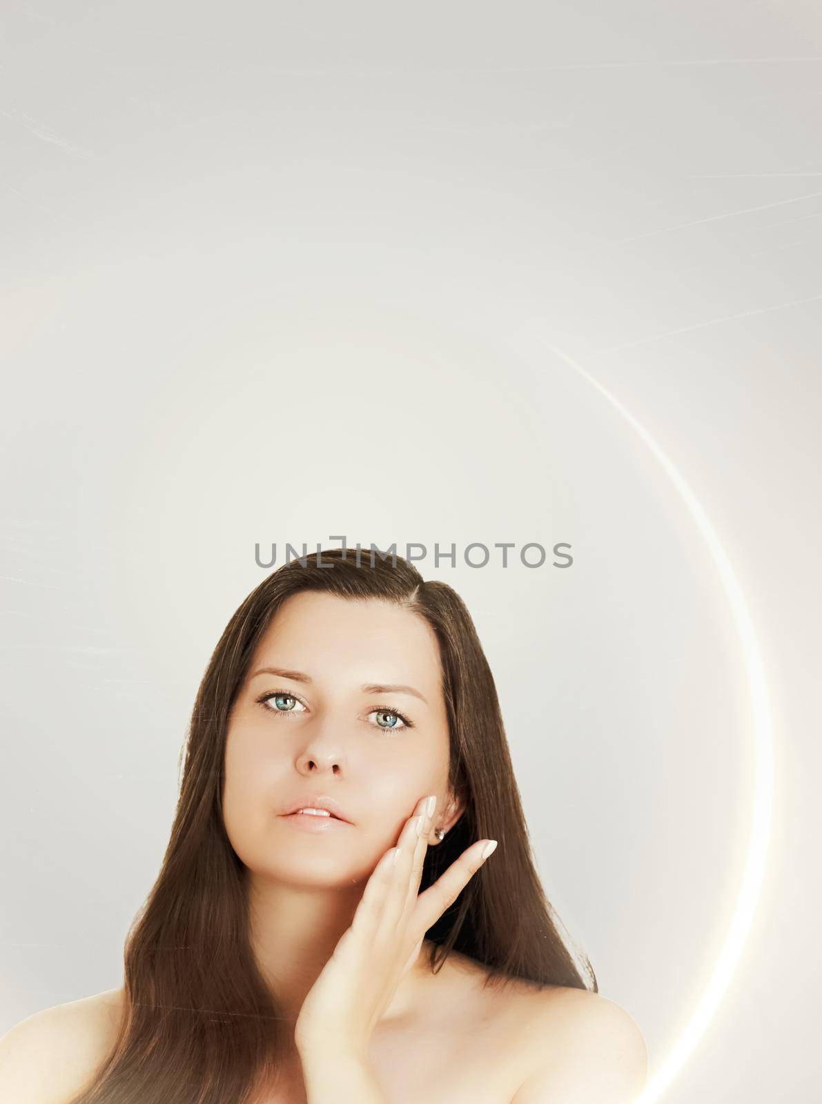 Suntan skin tone and beauty routine. Beautiful brunette female model with natural tan, face portrait of young woman by Anneleven