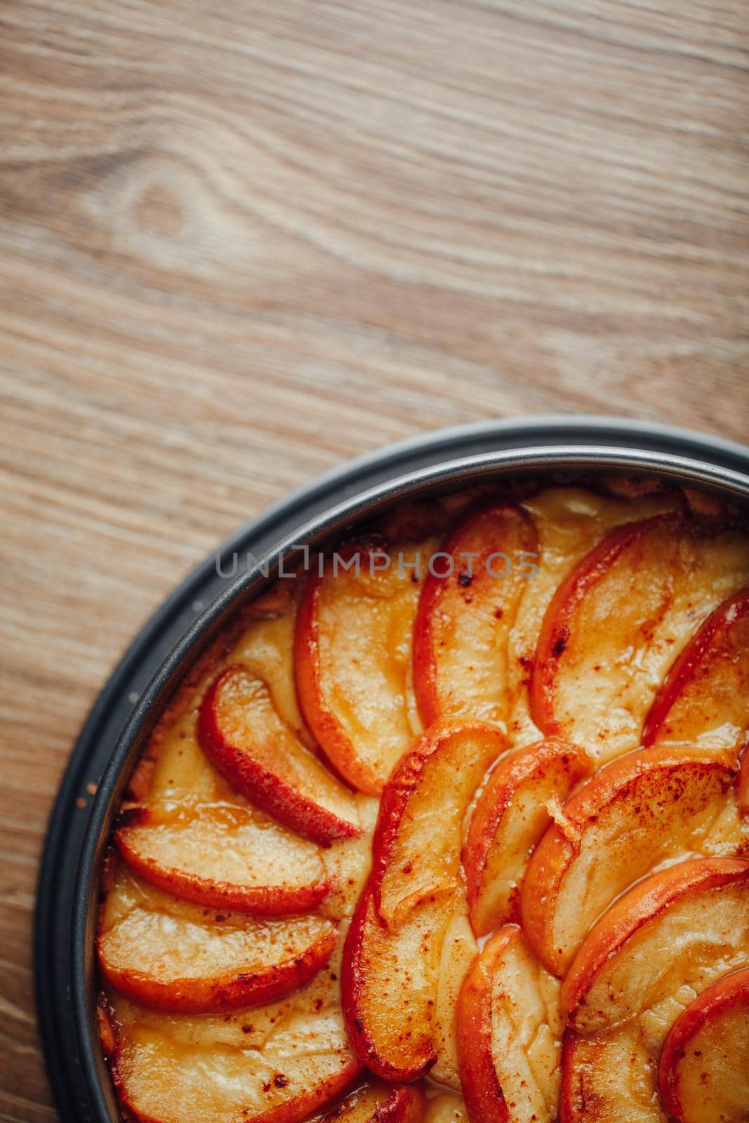 apple tart cake on wooden table top by nikkytok