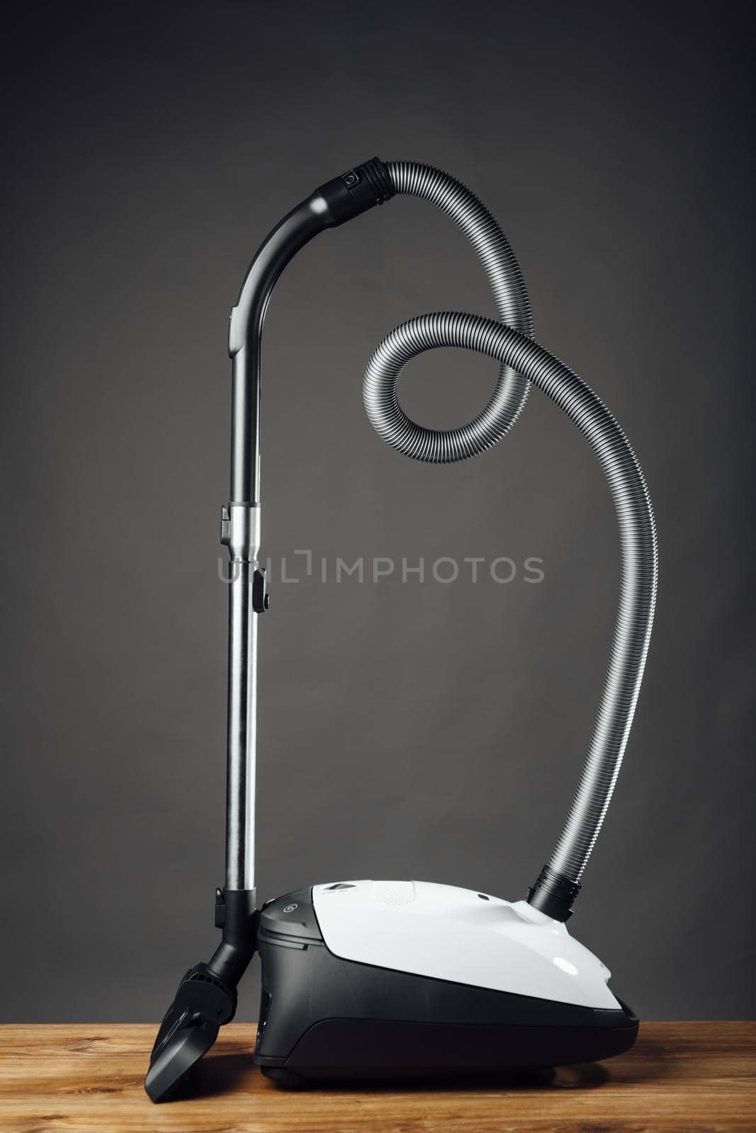 vacuum cleaner on grey background