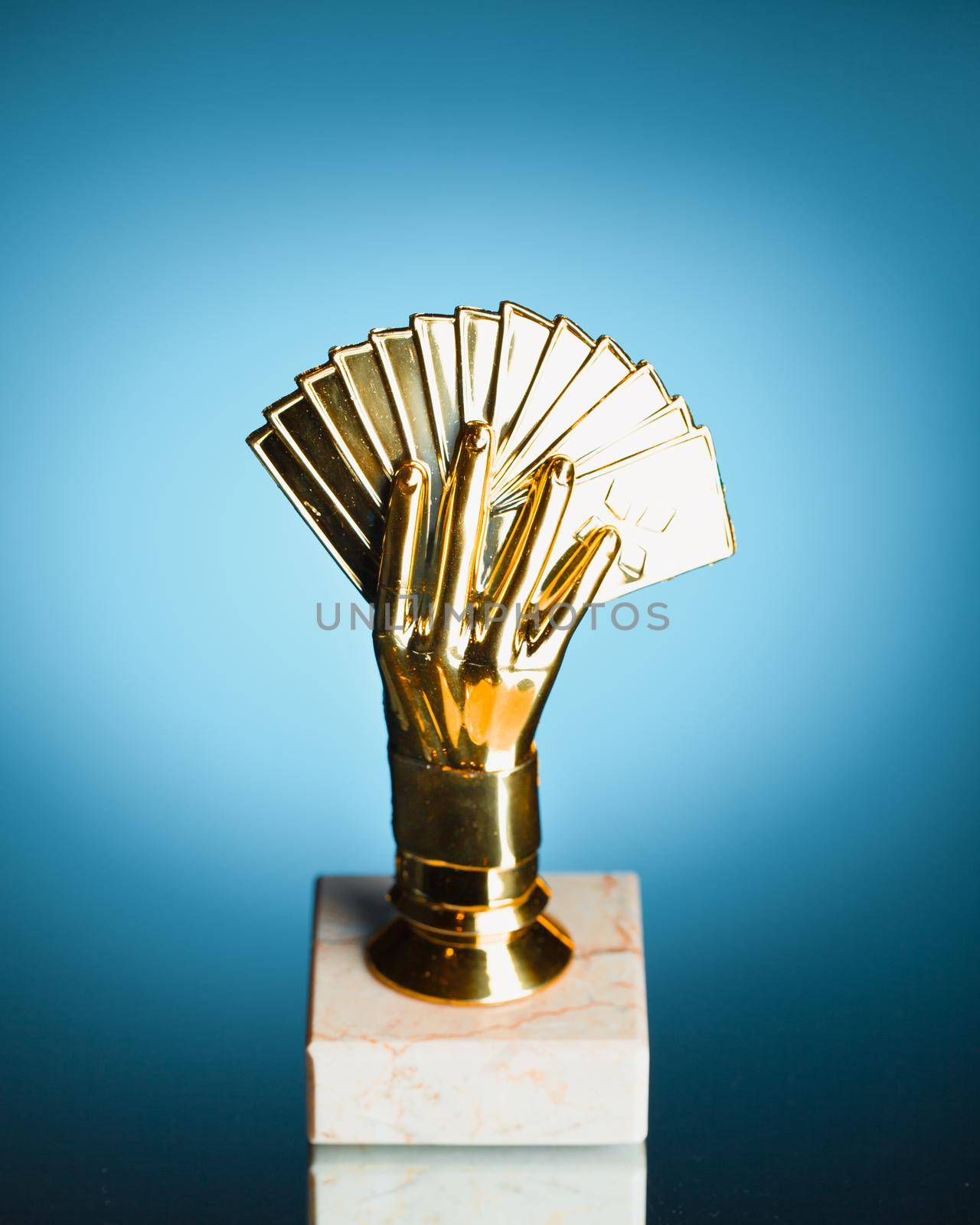 poker cards trophy on blue background