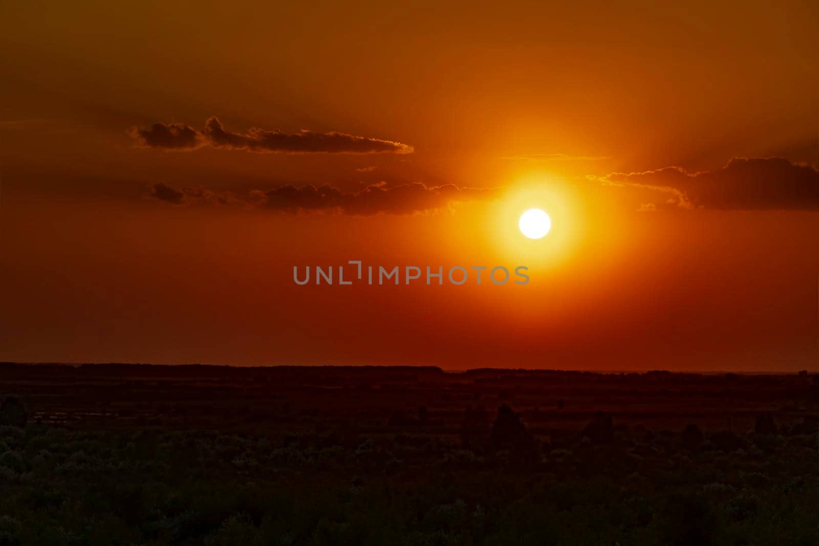 Sunset at the evening dawn.Morning dawn.Late evening.Evening sunset.The last rays of the sun in the evening hours and the onset of night.The first rays of the sun pass through the clouds.Glow pink sky by YevgeniySam